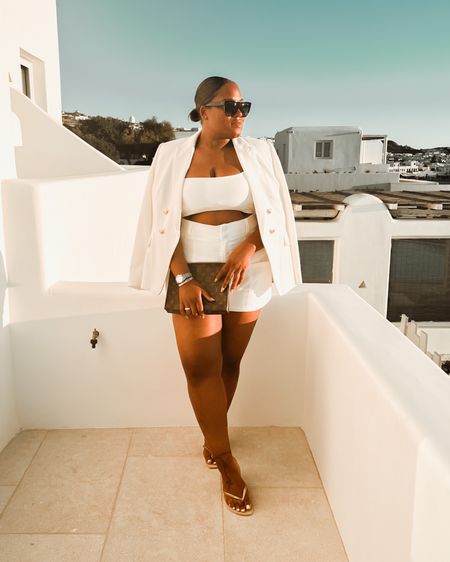 One of my favourite holiday outfits from Mykonos! A summer take on a traditional suit with white tailored shorts, paired with a one shoulder crop top. Spruced up with my double breasted blazer popped over the shoulders  

#LTKcurves #LTKHoliday #LTKSeasonal