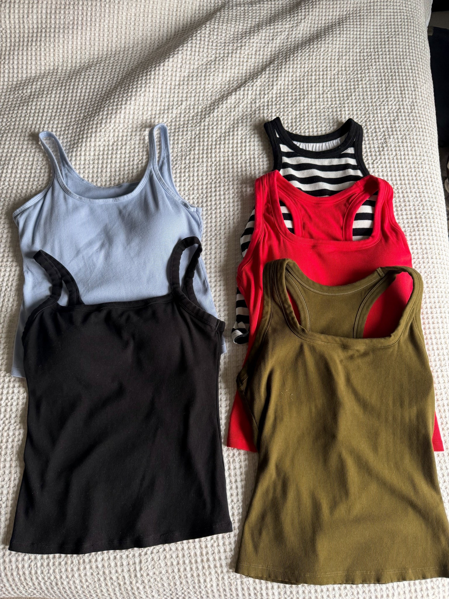 Braless (built-in bra tank tops) from Amazon, these are one of my favorite layering pieces but really easy to pack or throw on with a cute pair of pants in the summer! I wear a size XL ￼

