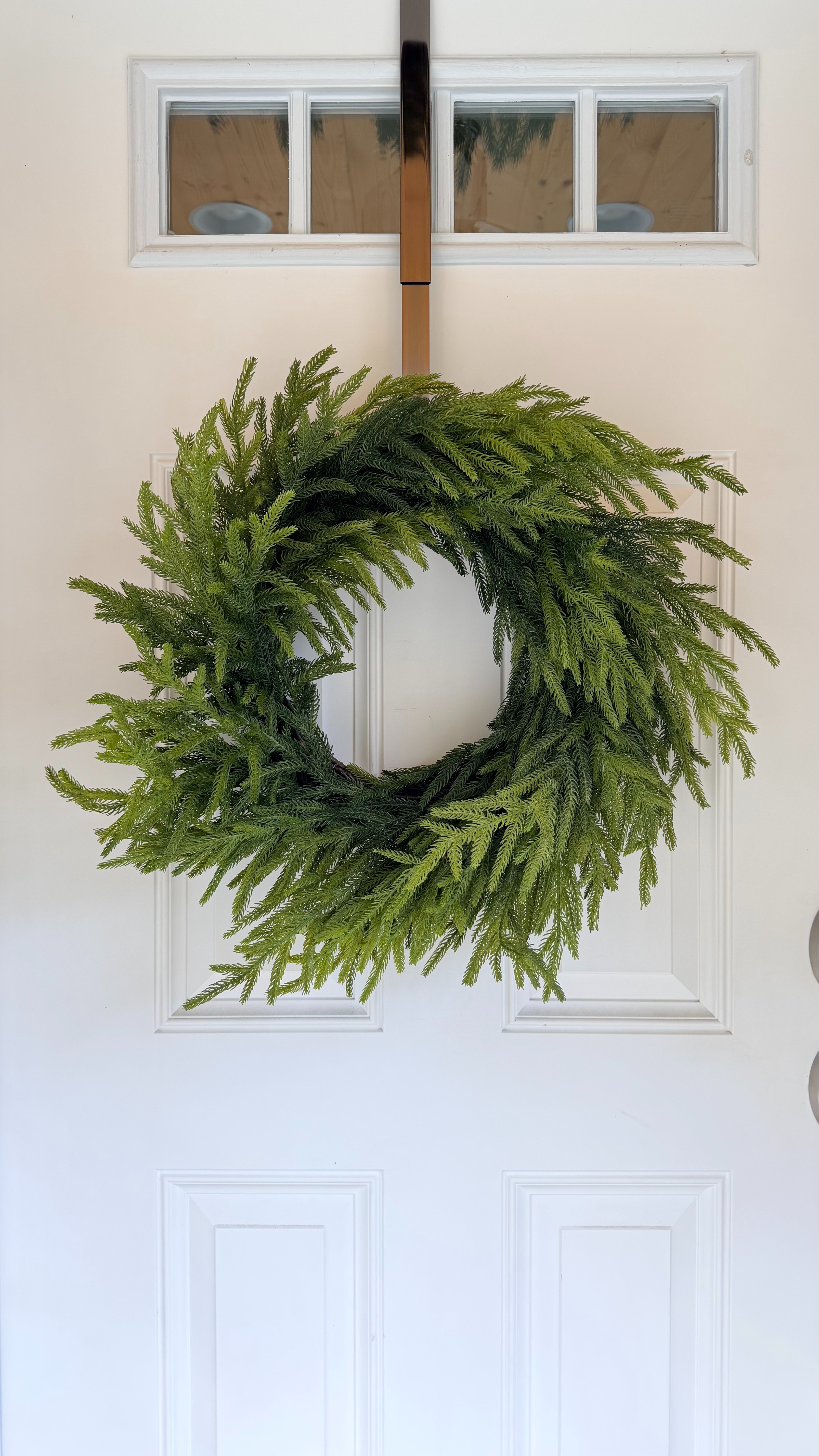 The faux wreath I ordered for our front door is really pretty. It's under $35 and is a nice size. It comes in a box, but once I took it out and fluffed it, then let it hang on our door a couple of days it opened up and looks good. I may add a ribbon or leave it plain. I like that I can use this wreath for other holidays if I want in the future by adding decorations for that season. 

 #LTKHoliday #LTKSaleAlert #LTKFindsUnder50