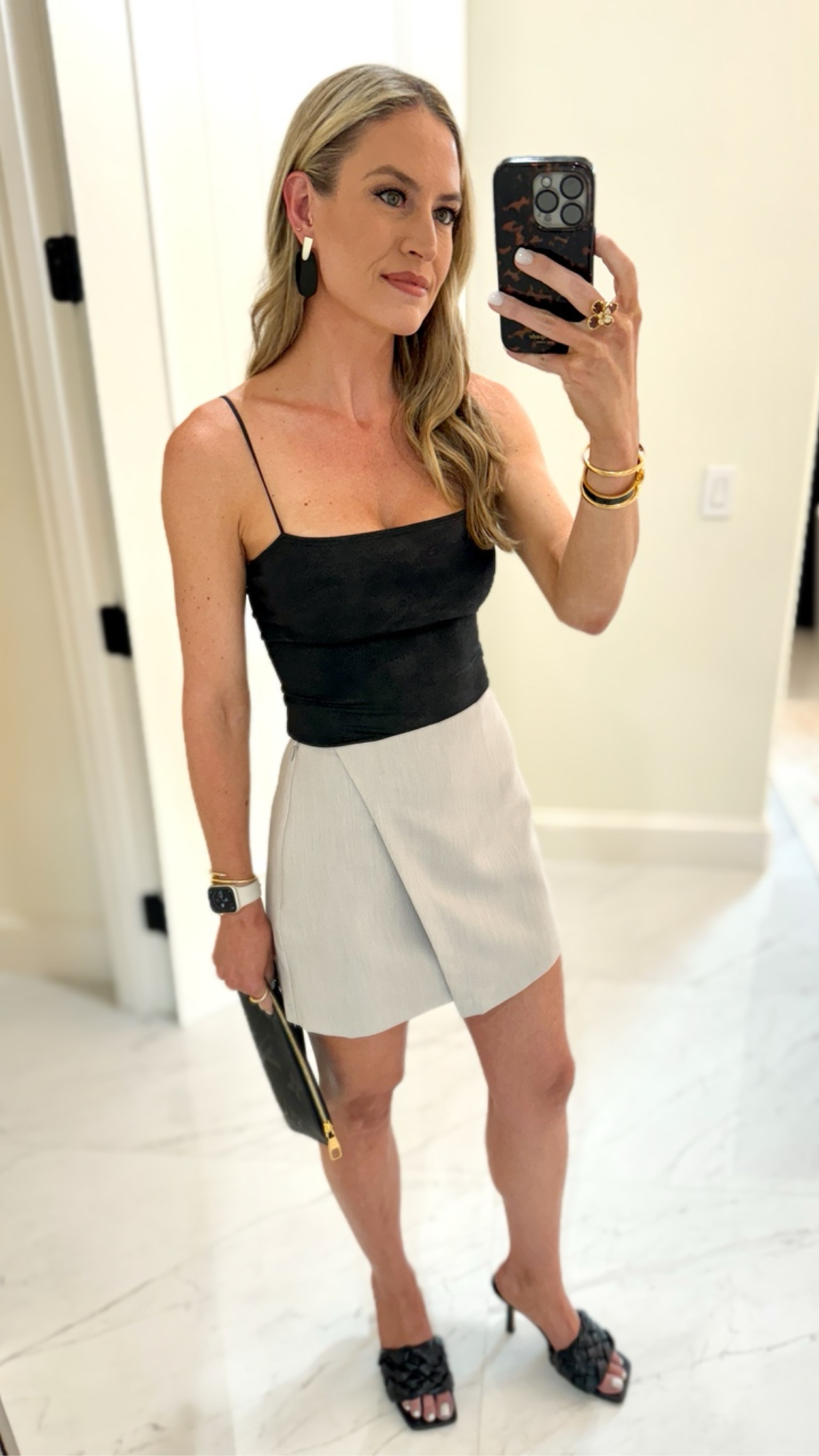 A simple outfit is sometimes best. This faux wrap SKORT is one of my faves to throw on and go. It comes in black as well and I have both! I’ve linked other SKORTS that I own and love and wore all through the year in every season. Runs TTS. 

#everypiecefits

Mini skirt 
Mini skort
Date night outfit
Date night dress
Summer dress
Spring dress 
Dinner outfit
Brunch outfit 

#LTKfindsunder50 #LTKparties #LTKSeasonal