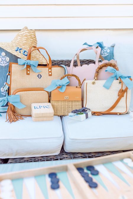 Mother’s Day Gifts 🎁 A handbag for every occasion, a beach hat, and a raffia backgammon set. The raffia and leather tote is a great work tote and holds a laptop and you can customize the strap, the scalloped leather tote is a great everyday bag, the raffia and leather crossbody and raffia and bamboo crossbody are perfect for days out and about, and the wicker and bamboo handbag is a a great evening bag. All can be monogrammed for Mom.



#LTKitbag #LTKGiftGuide #LTKFind