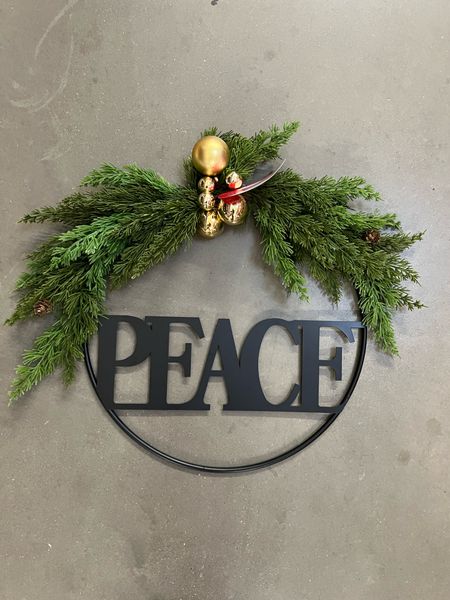 Holiday wreath 
Metal peace front door wreath 


#LTKHoliday #LTKSeasonal #LTKunder50