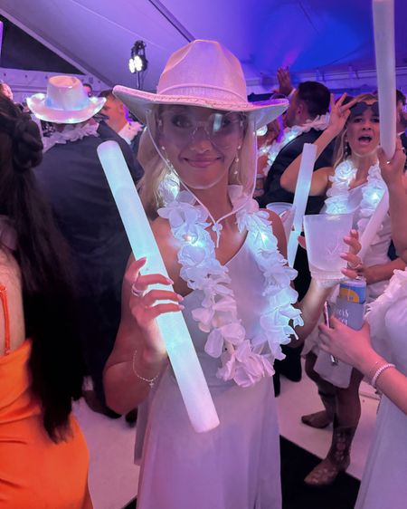 wedding reception party props/ white party foam light up sticks / white light up leis / white glow necklaces / white light up cowboy hat / clear heart glasses 

G’s Dress is from Nadine Merabi and she is wearing a S/M

#LTKStyleTip #LTKFindsUnder50 #LTKWedding