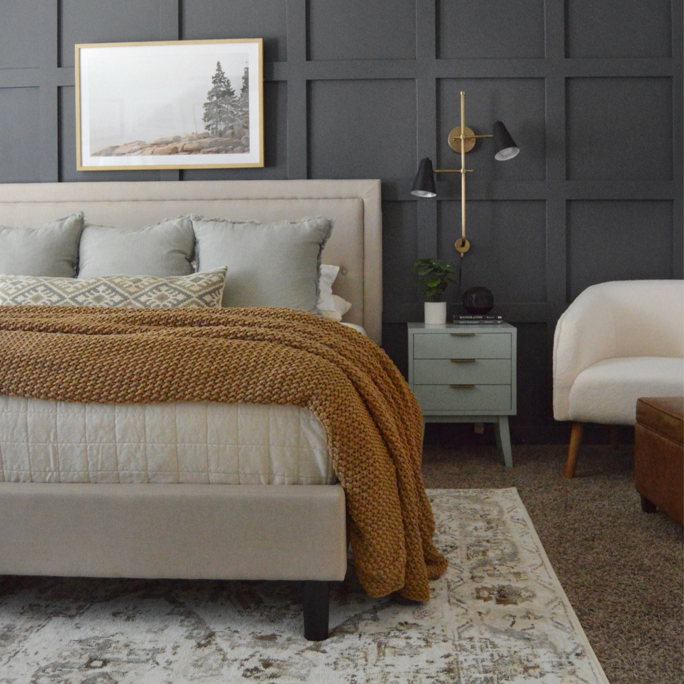 This bedroom makeover included new wall sconces, area rug, upholstered bed, quilt, throw, accent chair, throw pillows, and home decor!

#LTKfindsunder100 #LTKfindsunder50 #LTKhome