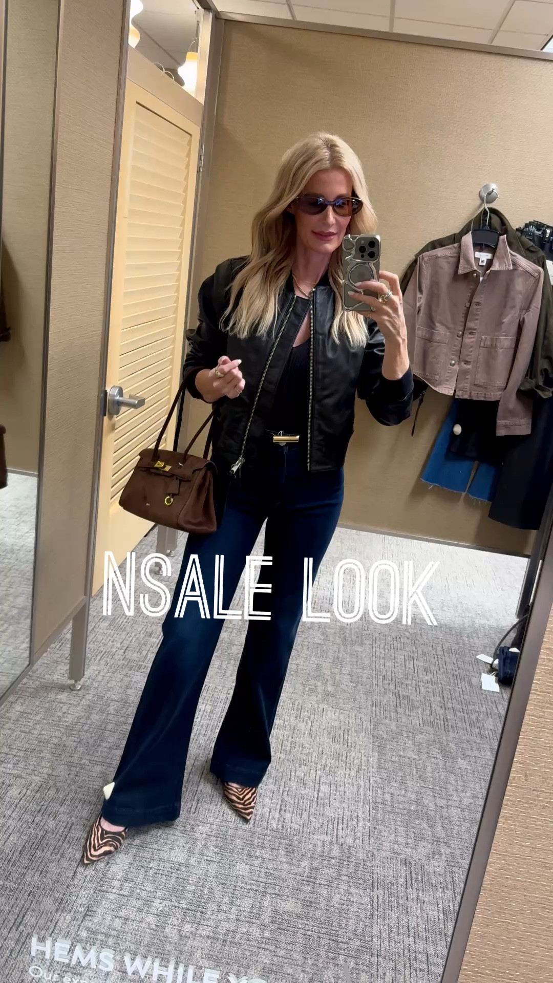 These Paige dark wash flare jeans are part of the Nordstrom Anniversary Sale and they are so incredibly flattering — I love the high-waisted fit because it creates such a long, slimming leg line. I styled them with this real leather AllSaints black bomber jacket and a chic brown suede JW PEI bag, both also included in the sale, for an easy fall outfit that feels polished and modern. I’m wearing an XS in the jacket and a size 24 in the jeans. #NSale #LTKOver40 #LTKStyleTip
 

 #LTKOver40 #LTKSaleAlert #LTKWorkwear