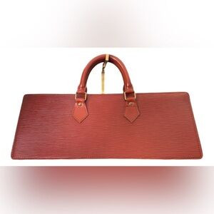 Louis Vuitton Epi leather Triangle Bag w/dust bag | Poshmark