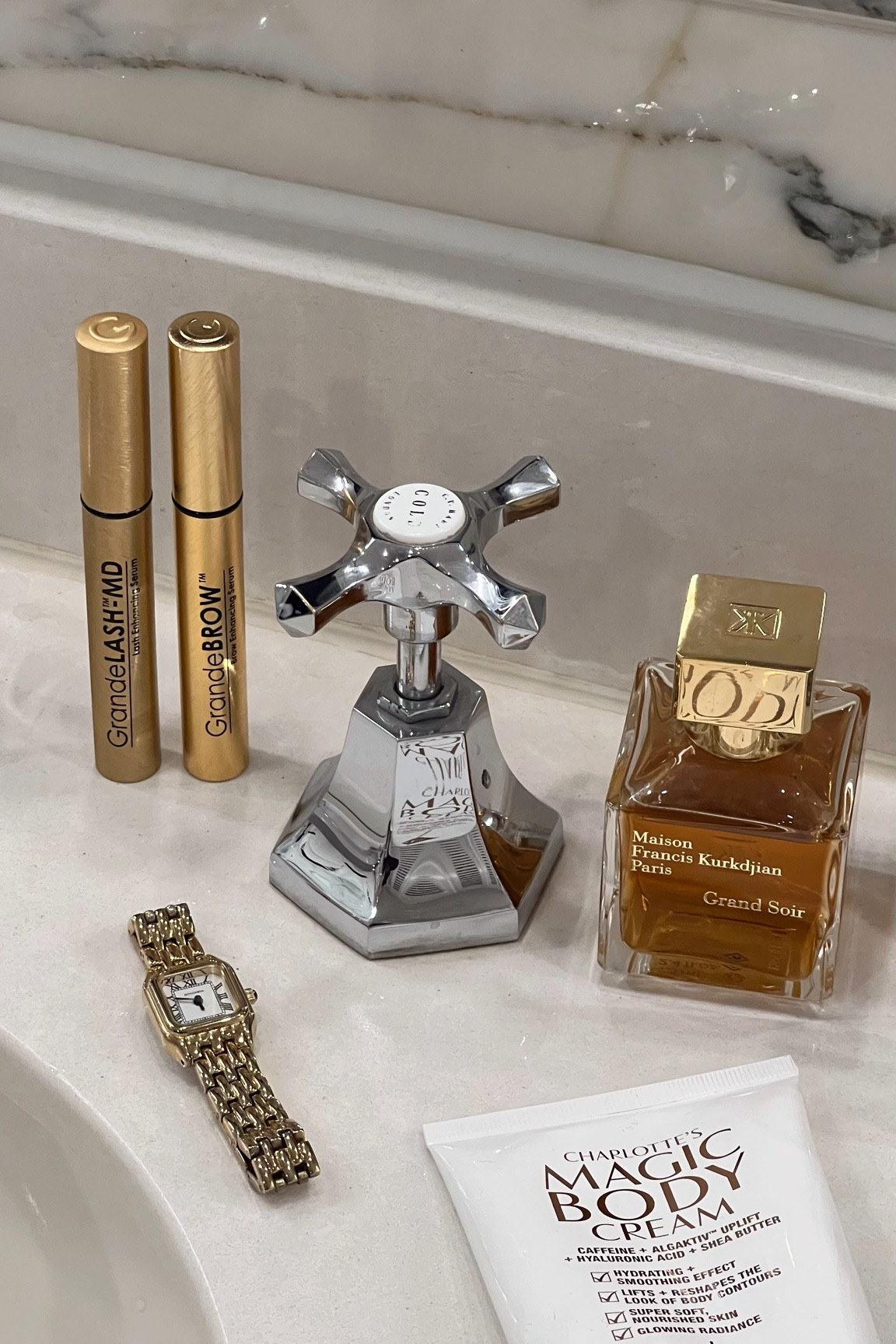 Festive essentials - grande cosmetics lash and brow serums, MFK Grand Soir perfume, Sekonda watch and Charlotte Tilbury magic body cream. #LTKGift 

#LTKeurope #LTKbeauty