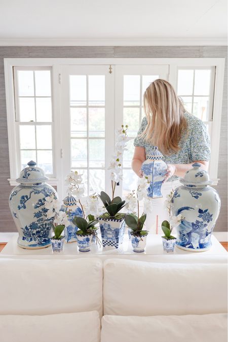 Blue & white home decor with beautiful jars and faux orchids. All linked for you. 

Blue and white jars, faux orchids, green floral blouse, floral puff sleeve top, j crew, Mackenzie Childs, MacKenzie-Childs, white slipcovered sofa, white cropped jeans

#LTKFind #LTKGiftGuide #LTKhome