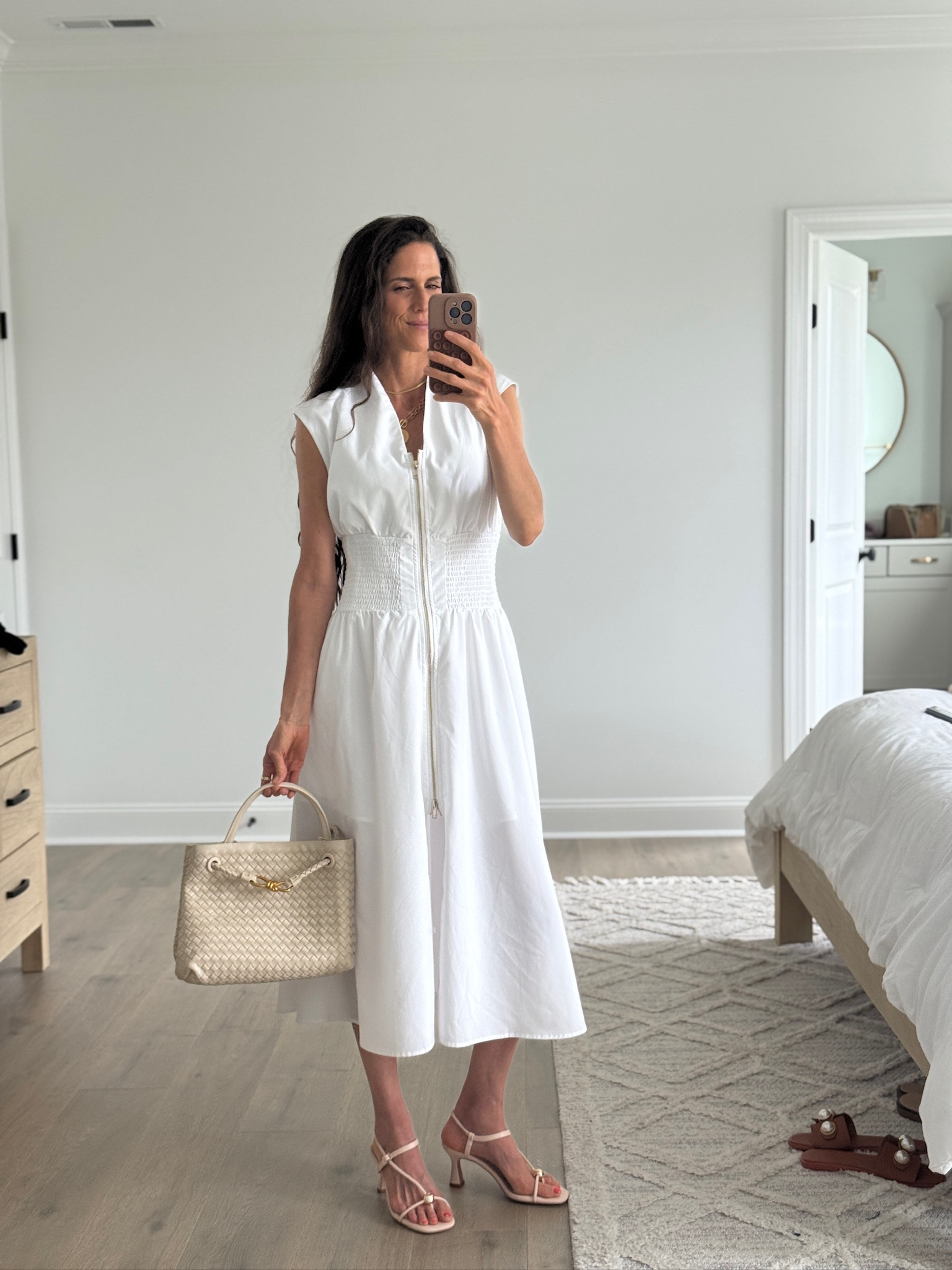 Easy white summer dress that looks so chic and elevated. Perfect for vacation, summer events, and everyday wear.

#LTKSeasonal #LTKmomlife #LTKootd