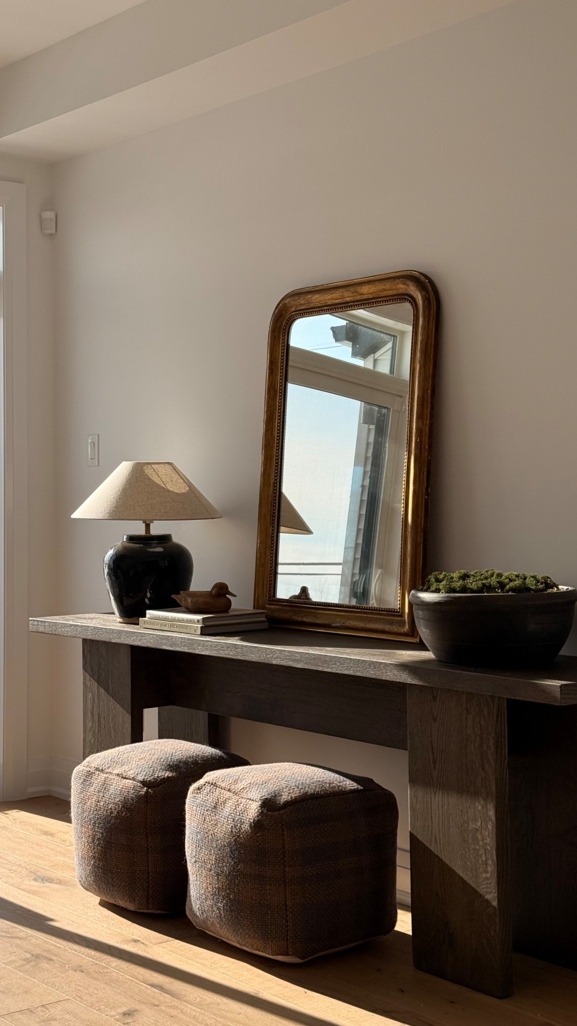 If you’re trying to make a new build or space feel warmer, start here:

• rich wood tones
• soft, diffused lighting
• at least one vintage-feeling piece (like this mirror)

Simple shifts, but they completely change how a room feels.

#LTKcanada #LTKhome