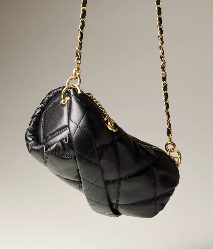 Small Bowling Bag

            
		Calfskin & Gold-Tone Metal
	
		Black | Chanel, Inc. (US)