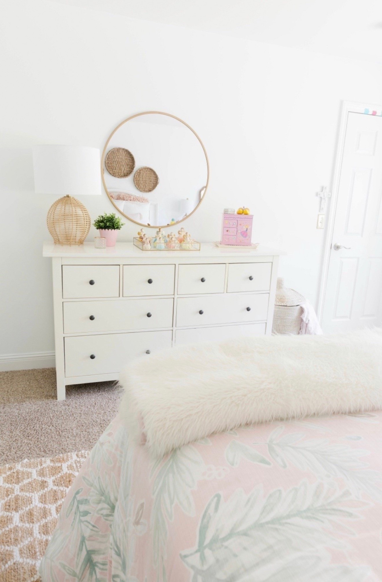 This pink and white girls bedroom is cute without being cluttered. A super affordable white dresser, jute rug and round mirror all complete the look! 



#LTKSaleAlert #LTKHome #LTKU