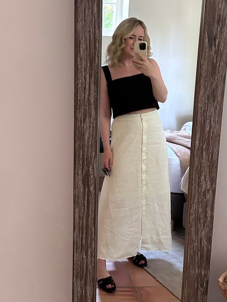 Summer outfit featuring linen midi skirt (8) from & other stories and linen crop top (8) from Reformation
Ysl sandals
Vacation outfit
South of France outfit 