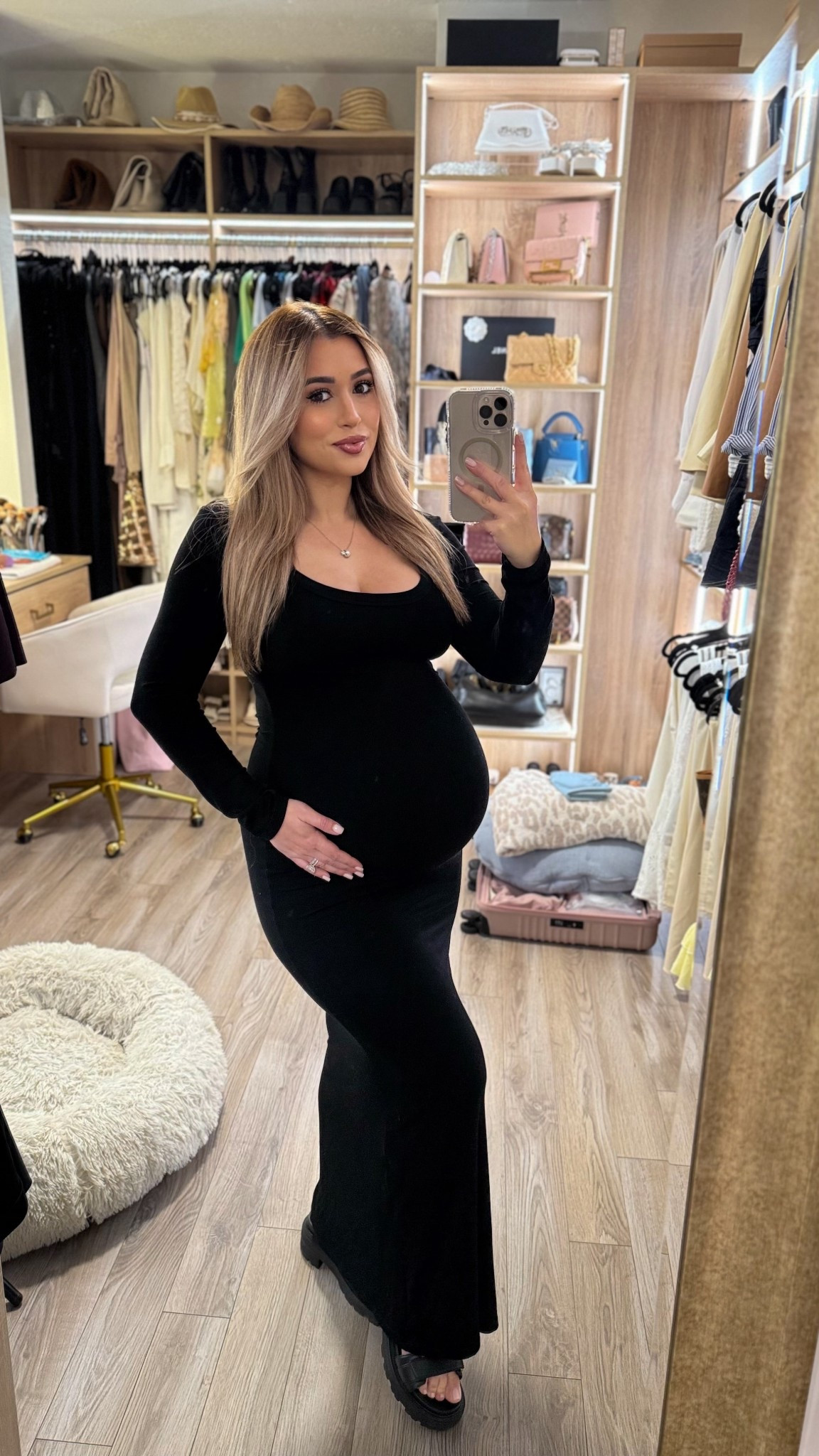 Obsessed with this dress! I bought 2 in black to have throughout my pregnancy and an olive one for fall. Wearing a size medium and I’m 9 months pregnant. This dress is not sheer when it stretches for me and fits perfect in length and I’m 5’2”. So comfortable and only $38 🖤

#LTKFindsUnder50 #LTKPetite #LTKBump