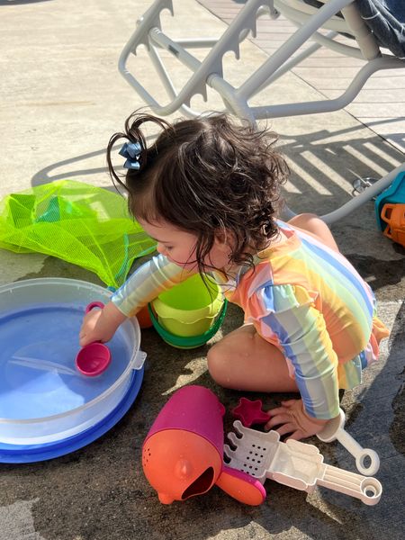 Cutest baby rash guard and the best sand toys! 