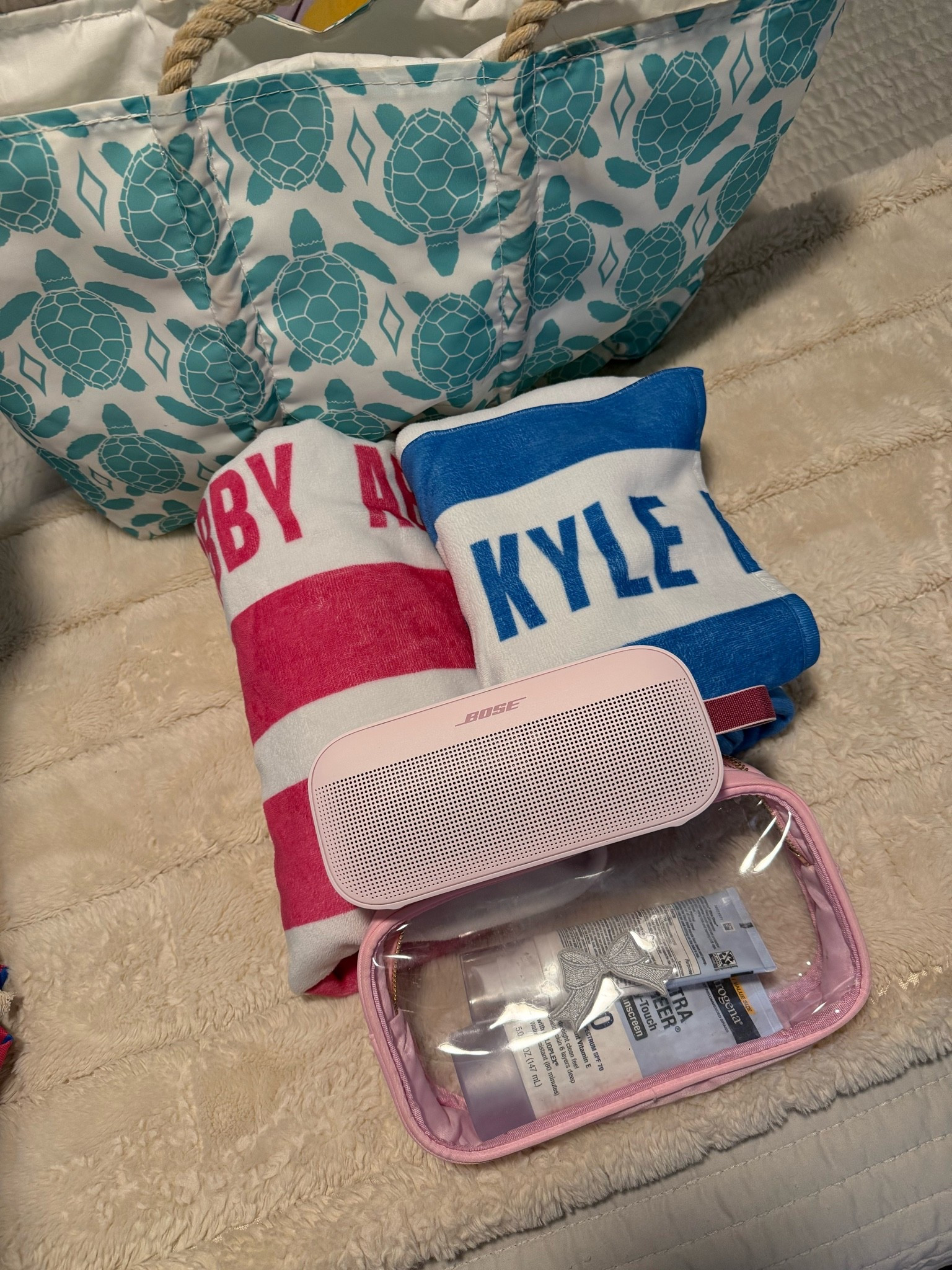 Pool and beach must-haves!! Love our monogrammed towels, Bose Speaker, Neutrogena sunscreen, Sea Bags tote and KenzKustomz pouch!

#LTKSeasonal #LTKTravel #LTKSwim