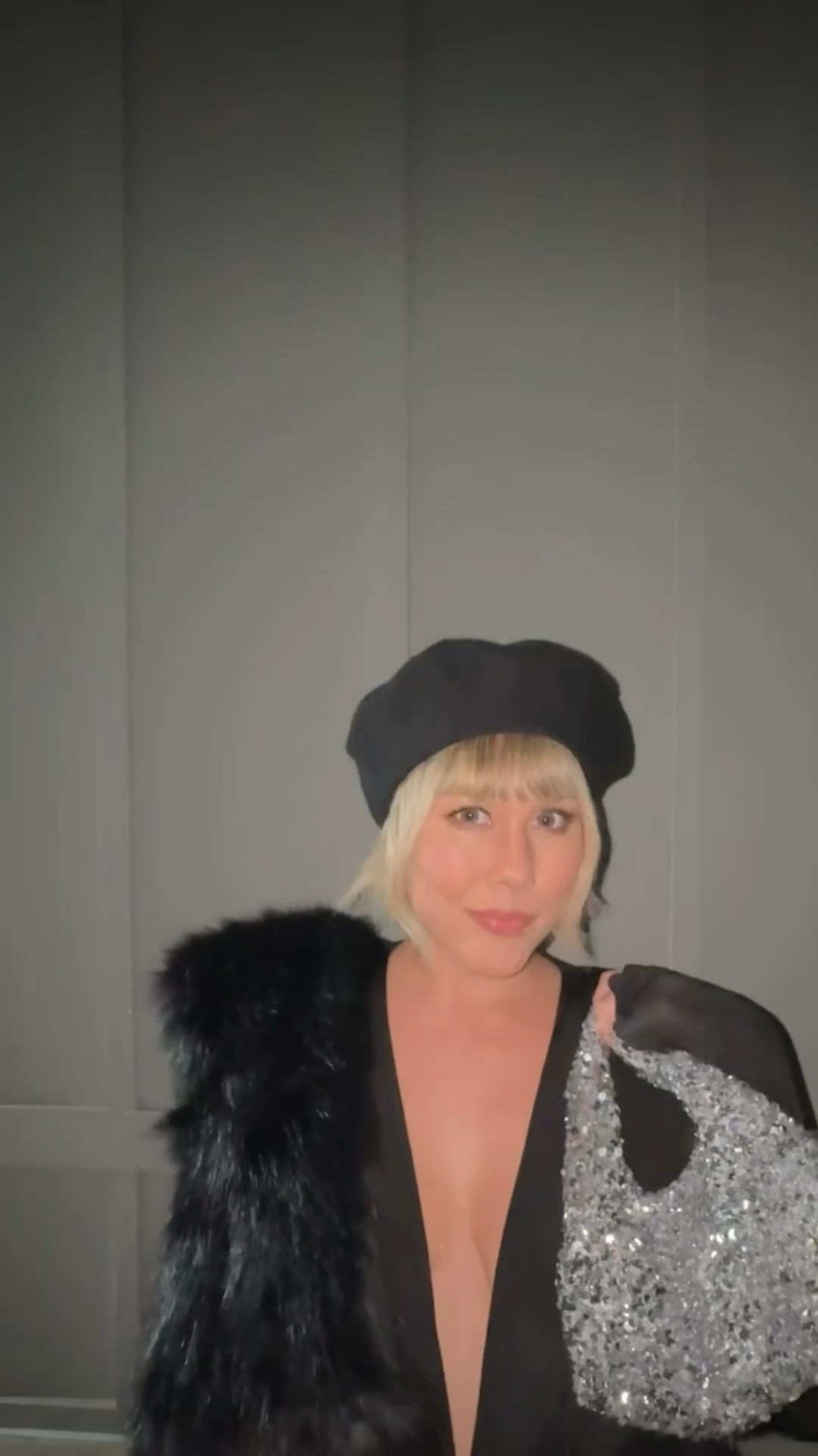 Beret, faux fur scarf, silver sequin bag, black plunging bodysuit, midi bubble skirt and pointed gold cage pumps 🫦

#LTKStyleTip #LTKItBag #LTKParties