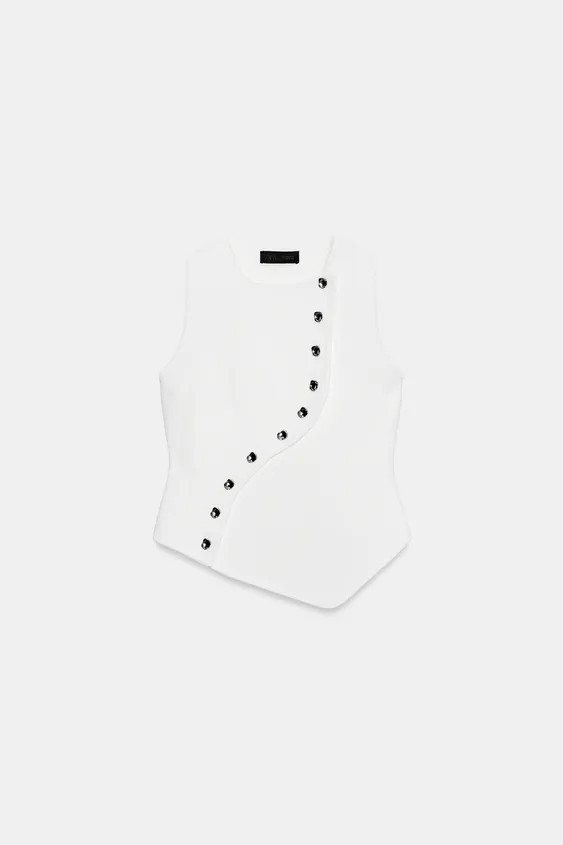Round neck, sleeveless top with an asymmetric front fastening and hem. | Zara UK