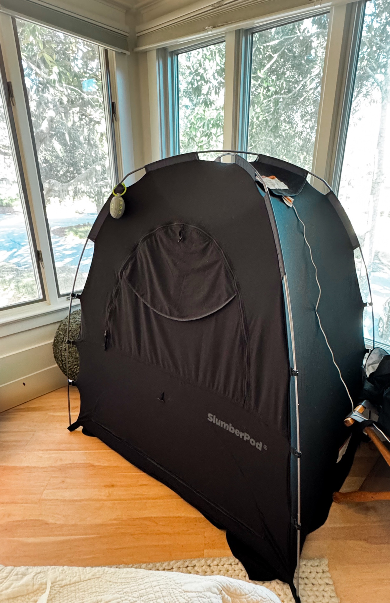 We DO NOT travel without this Slumberpod. It’s the best portable blackout curtain system out there. 

You put it over the crib and there is a pocket for a sound machine or fan and a pocket for the camera. 

#LTKBaby #LTKFamily #LTKTravel