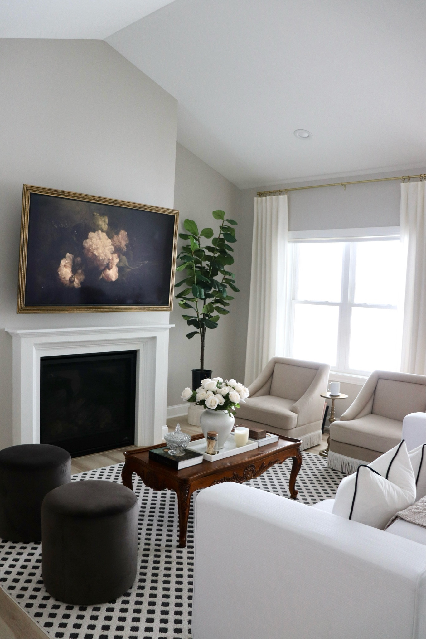 Keeping our living room furniture low profile was a decision we made to keep the space feeling open. It allows more light in from the windows & allows the open concept space to flow better.

Modern vintage home. Living room. Accent chair. White couch. Vintage coffee table. Neutral home. Ottomans. French provincial. 

#LTKfindsunder100 #LTKfindsunder50 #LTKhome