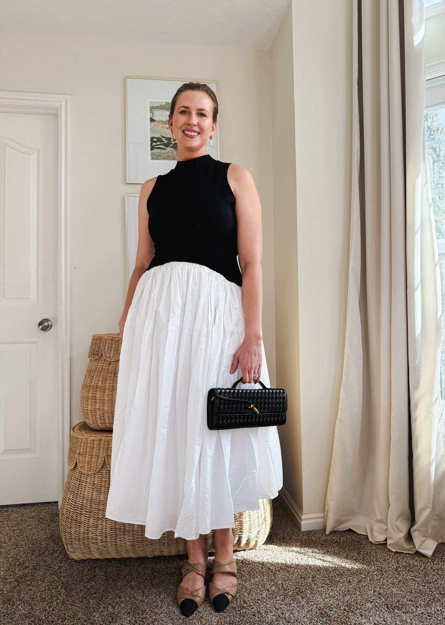 I just love the arch waistline on this French Connection dress as it’s so flattering around the waist and flares out beautifully with a full skirt. I’m wearing a size large, and it’s slightly roomy for my comfort. 

I’ve paired it with a black woven faux leather clutch and cap toed mules. 

@ltk @dillards @French connection 

#easter outfits women #date night outfits #spring outfits 2026 #spring dresses #easter dress women #vacation outfits beach #ltkshoecrush #ltkseasonal

#LTKTall #LTKootd #LTKOver40