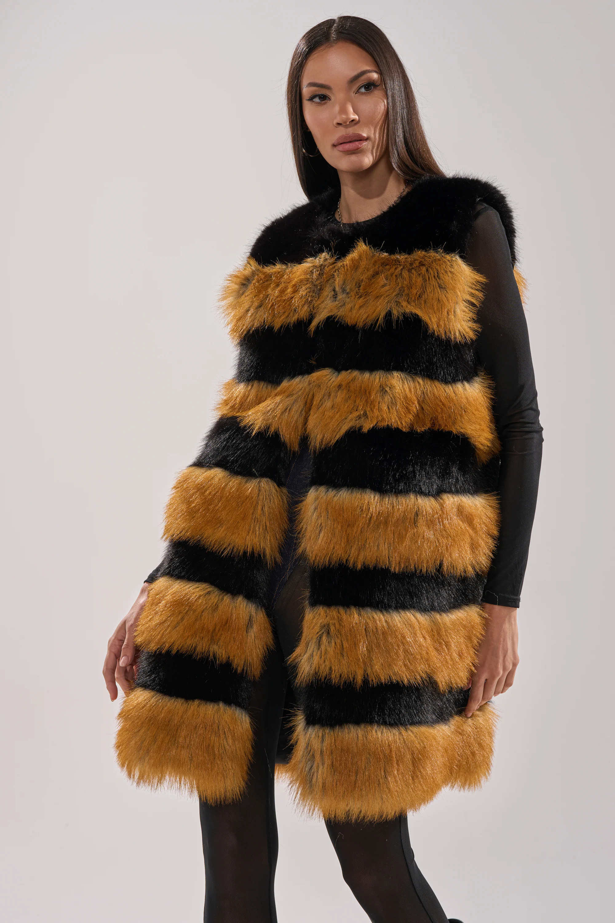 IN ANOTHER LIFE PANELED FUR VEST | AKIRA