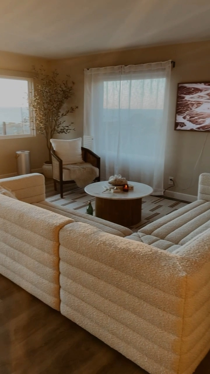 Our room design is almost done 🤗 This Boucle sectional is a showstopper and sooo comfy!

#LTKfamily #LTKstyletip #LTKhome