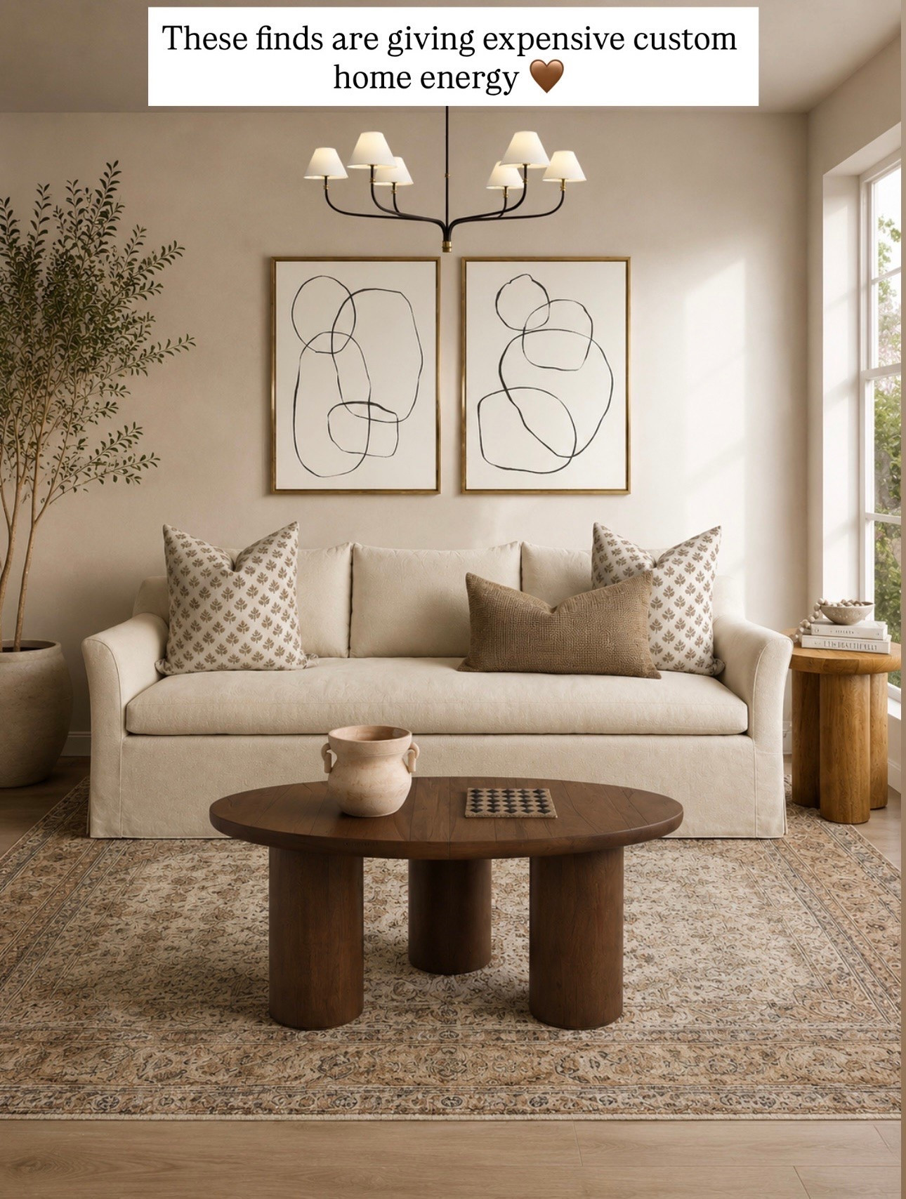 Everything in this room looks like it was sourced by a designer for a custom build 🤎Neutral finds that make your home look instantly more elevated! 
The coffee table, chandelier, sofa combo?? This whole room feels high-end.

#LTKHome #LTKSaleAlert