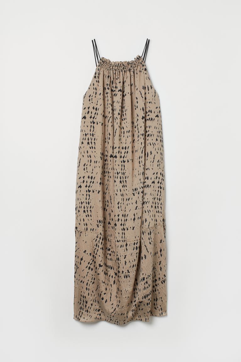 Airy, calf-length dress in a woven lyocell blend with a slight sheen. Narrow, double shoulder str... | H&M (US + CA)