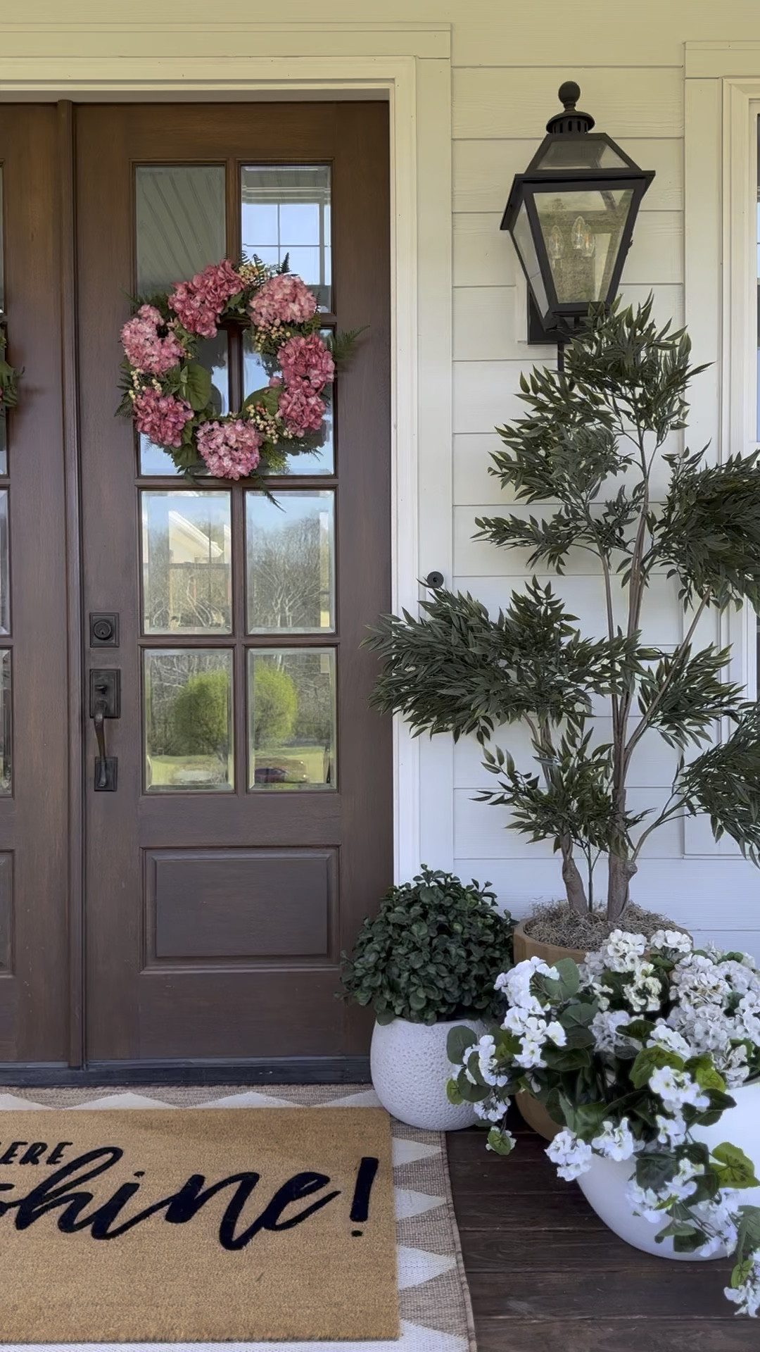 Spring and summer front doors! I love the green and pops of pink! I used uv resistant flowers and trees so no watering or maintenance!

#LTKSeasonal #LTKHome