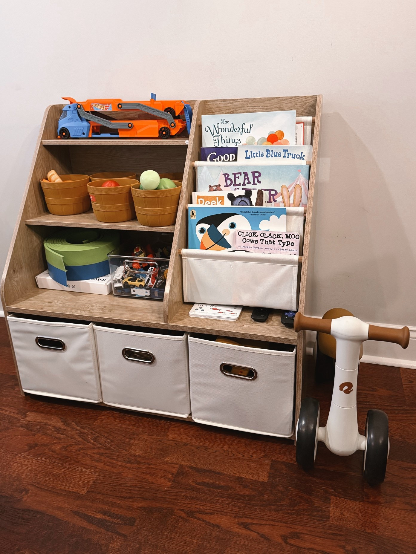 Our living room play station! We use to use a big laundry basket for all the toys kept in our living room but now they are organized and a lot easier to maintain a toy rotation. 

Living room organization, toys, kids, toddler, play room, mom life 

#LTKHome #LTKKids #LTKmomlife