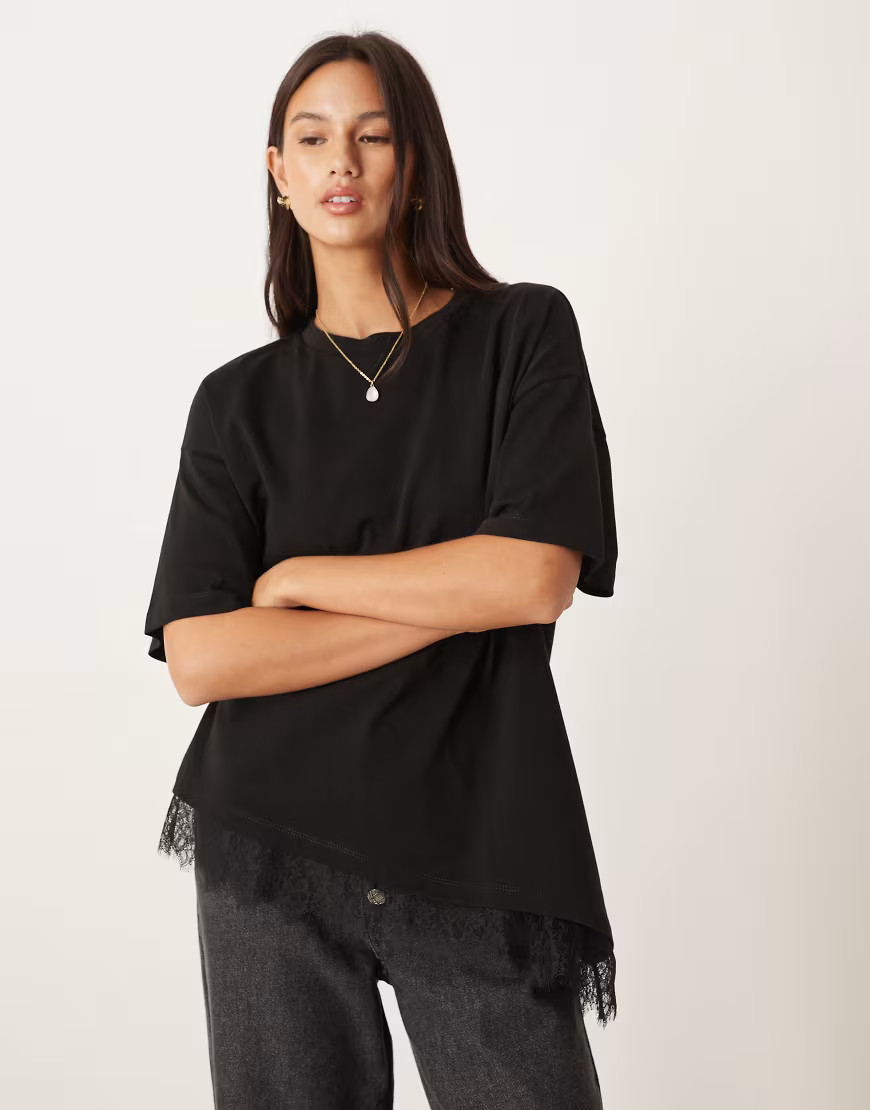 ASOS DESIGN longline asymmetric tee with lace trim detail in black | ASOS (Global)