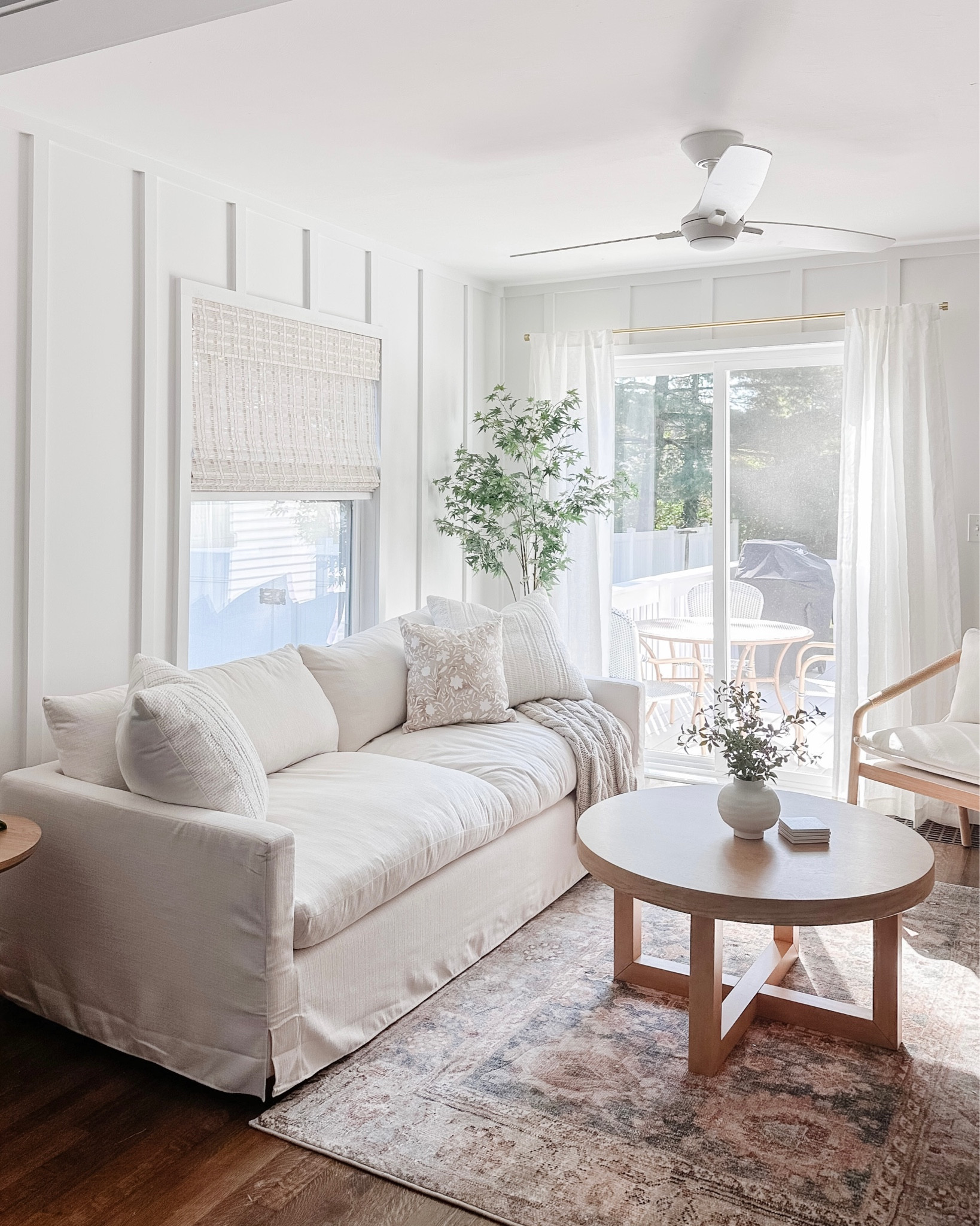Guest Cottage Living Room✨

Neutral decor, white sofa, round coffee table, throw pillows, blue vintage style rug, faux tree, target threshold, bamboo roman shades, white linen curtains, studio mcgee accent chair, coastal farmhouse

#LTKhome #LTKfamily #LTKfindsunder100