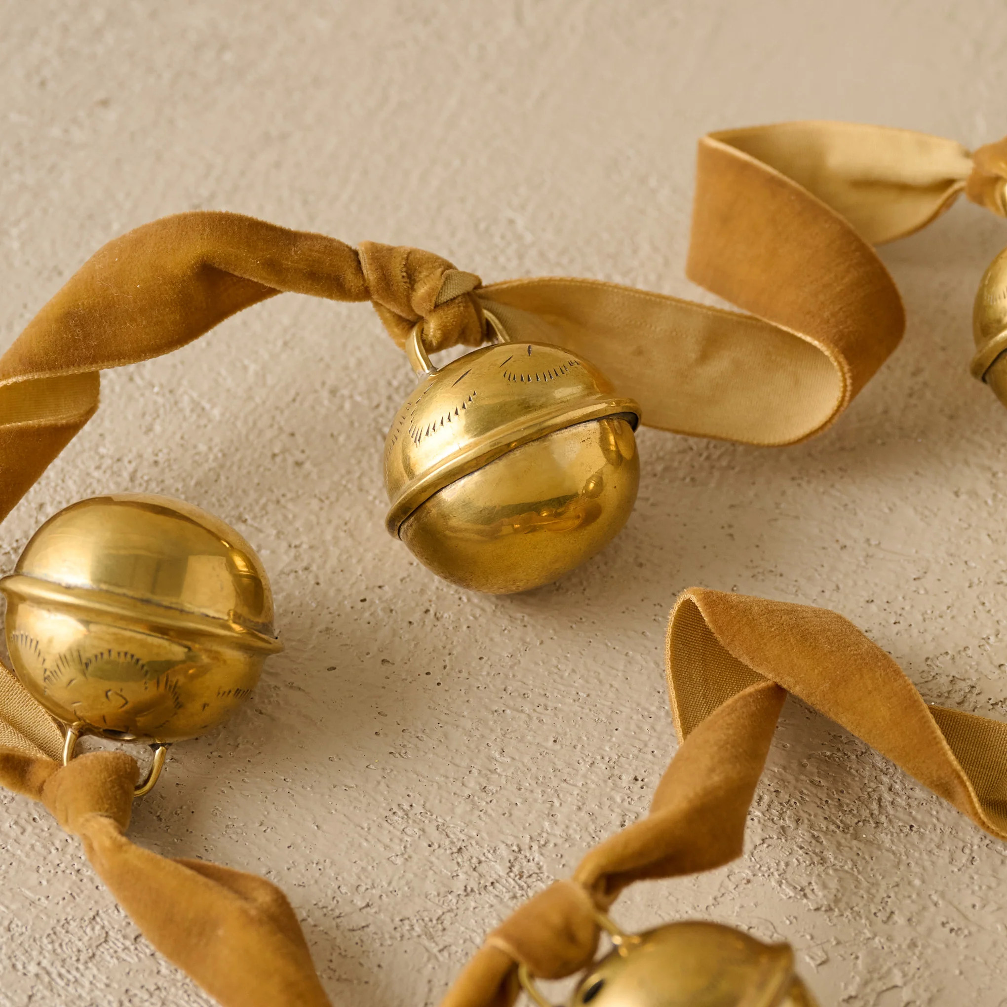 Etched Solid Brass Jingle Bell Garland | Magnolia