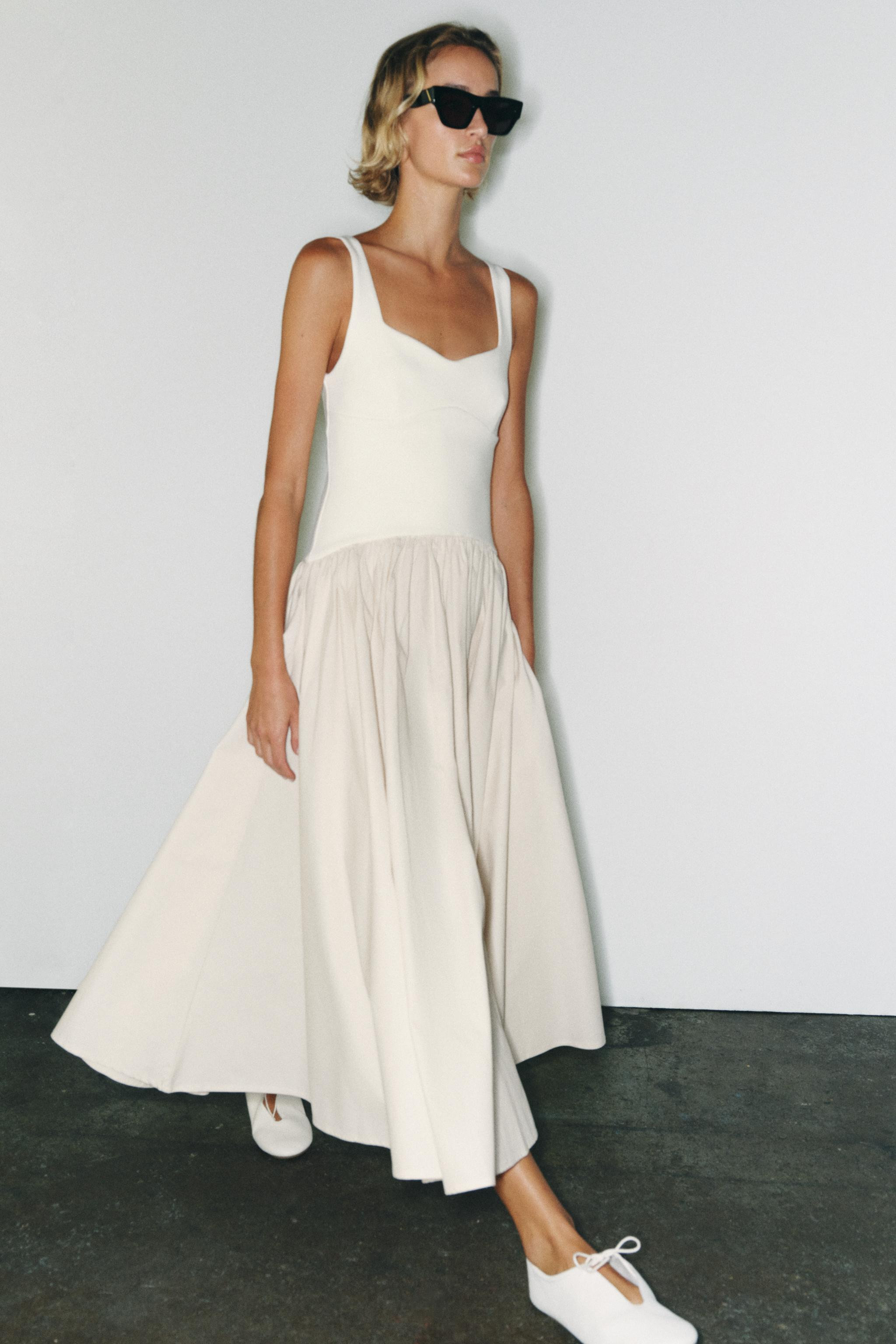 Dress made with a main fabric of cotton yarn. Sweetheart neckline and wide straps. Featuring a co... | Zara UK