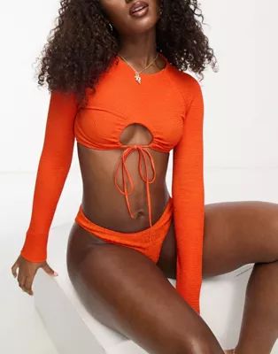 ASOS DESIGN mix and match crinkle long sleeve bikini top with keyhole tie back in deep orange | ASOS (Global)