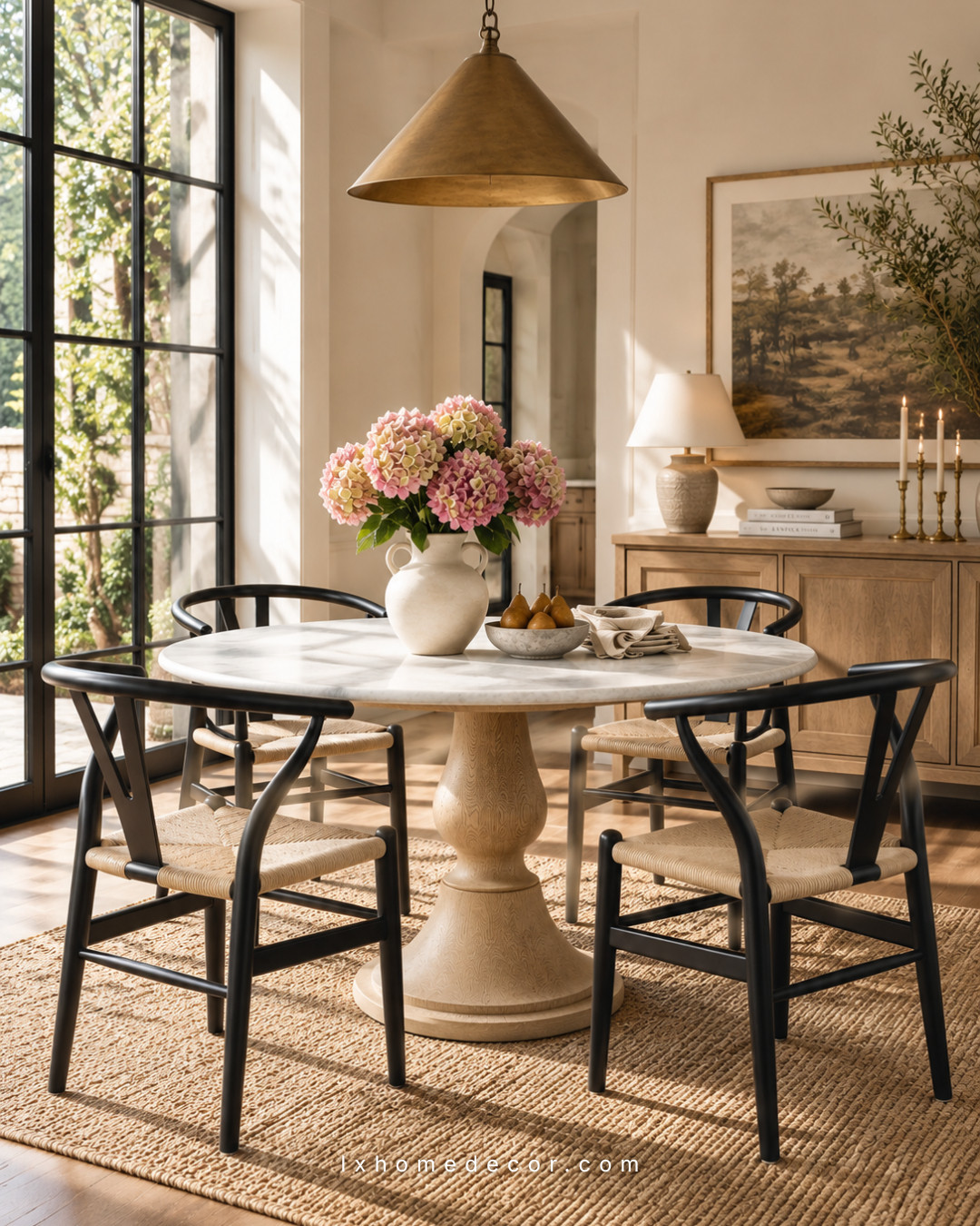 Trying to find a dining table that feels both elegant and everyday practical? I love how a round dining table can make a space feel more inviting while keeping conversations natural and comfortable. This setup blends warm textures, soft tones, and timeless details for a cozy dining area that doesn’t feel overdone. Would you choose a classic round table for your home? Save this look and shop the style.

#DiningRoomDecor #RoundDiningTable #HomeInspiration #NeutralInteriors #DiningRoomIdeas
round dining table, modern dining room decor, timeless furniture style 

 #LTKOver40 #LTKHome #LTKSaleAlert