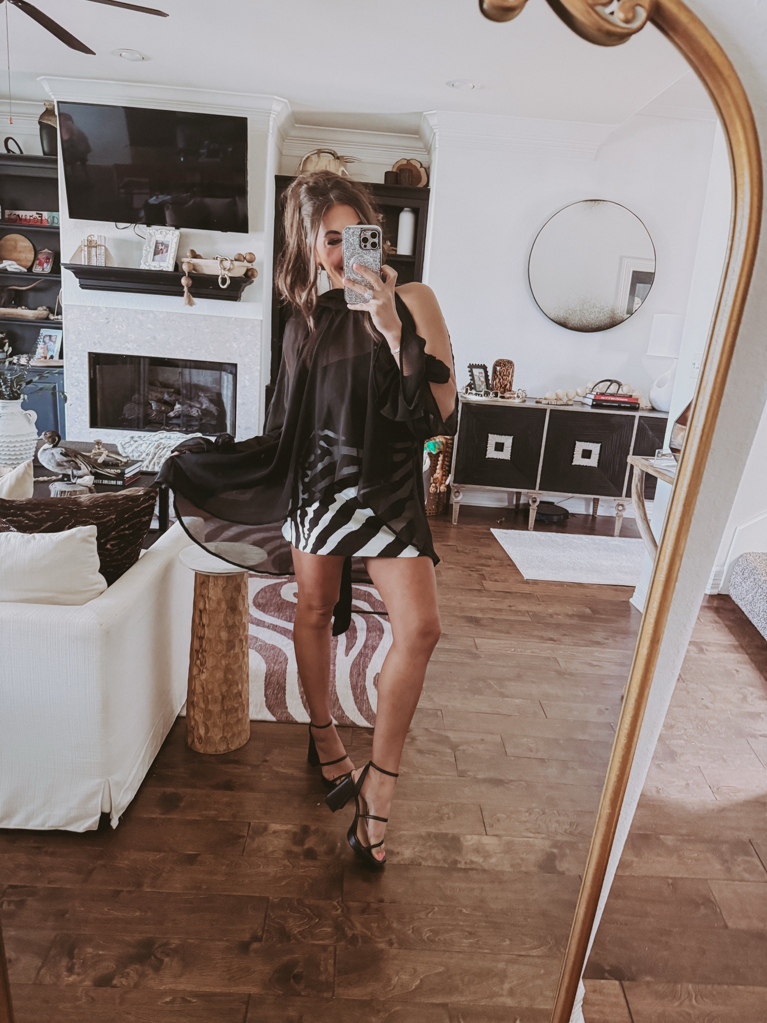 Dressed up this gorgeous look for a night out! 🌟 Wearing the sheer blouse (S) + tube top (XS) with the zebra skirt (XS) and these killer heels!

#LTKPetite #LTKootd #LTKSaleAlert