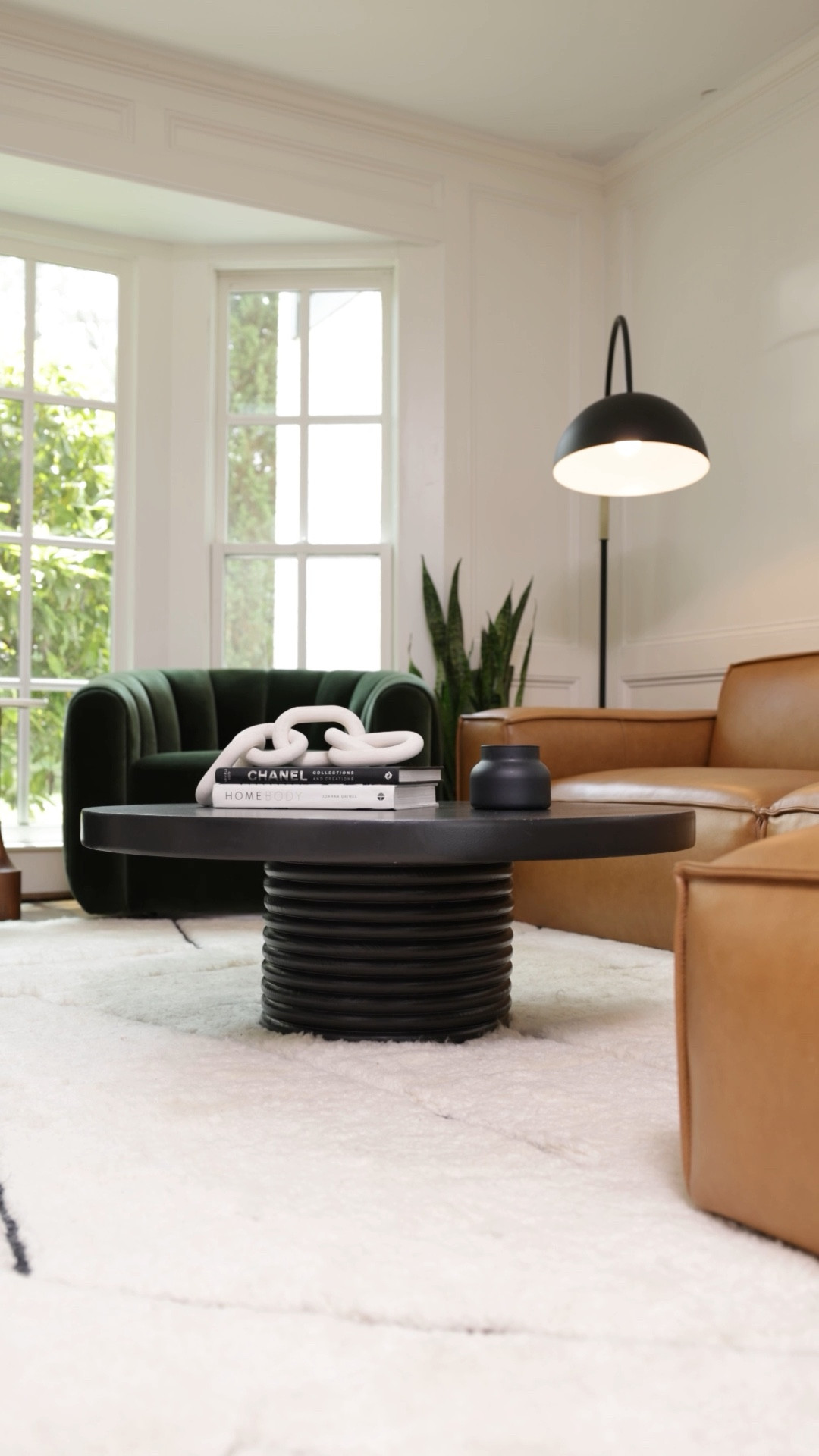 Modern living room - green chairs - leather couch - modern coffee table