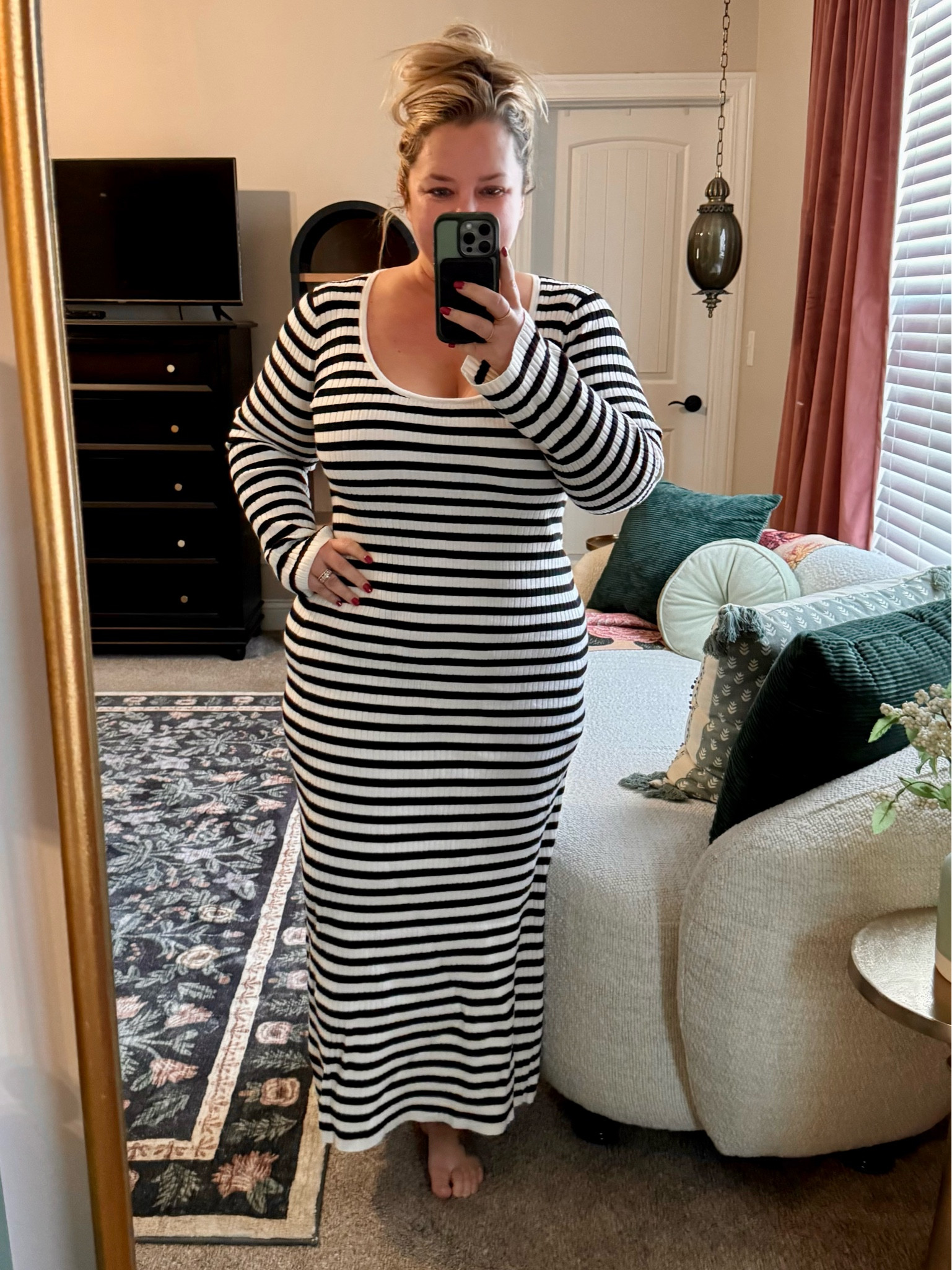 ON CLEARANCE for just $22 🤯 This sweater dress (& I use the term lightly bc it’s not a heavy material, I get too hot for that!) is hugging curves in all the right places!! I’m in my usual  XL (size 16 is my norm) & I’m 5’2” so if you are much taller than me, it will be more like a midi length but it’s the perfect maxi on me! 

#LTKStyleTip #LTKPlusSize #LTKFindsUnder50