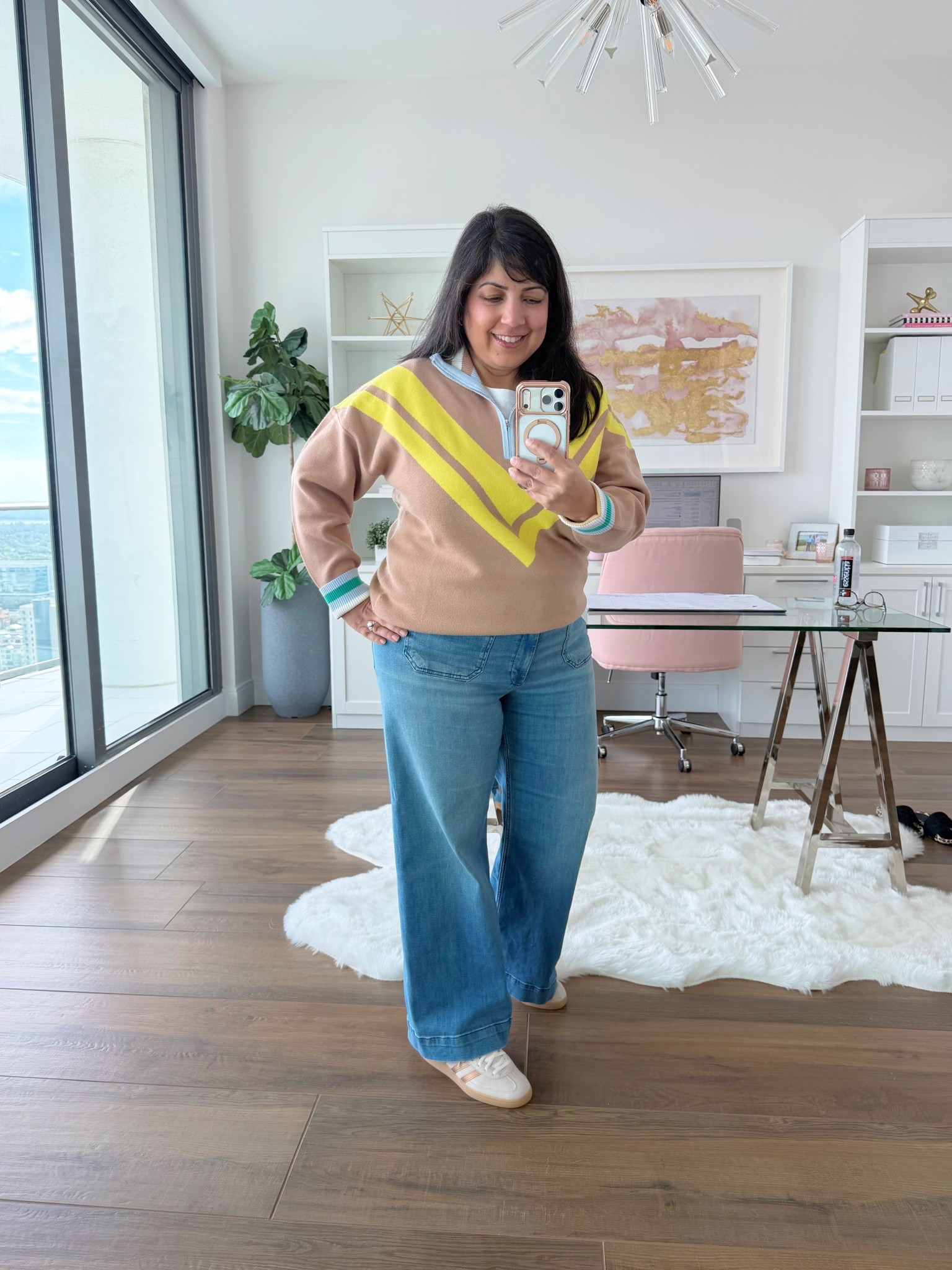 What I wore for a casual day out. This fun colorful Avara sweater is now available in a brand new beautiful color combo. Wearing this original style sweater in size large. Anthropologie Colette full length jeans are so soft and comfortable. Wearing them here in size 32 Petite. Adidas Spezial sneakers in this pretty gold metallic color way. Sizing is different so make sure you size down. I normally wear a women’s size 7.5 or 8 depending on the brand and I wear these shoes in a size 7. 

#LTKOver40 #LTKMidsize #LTKPetite