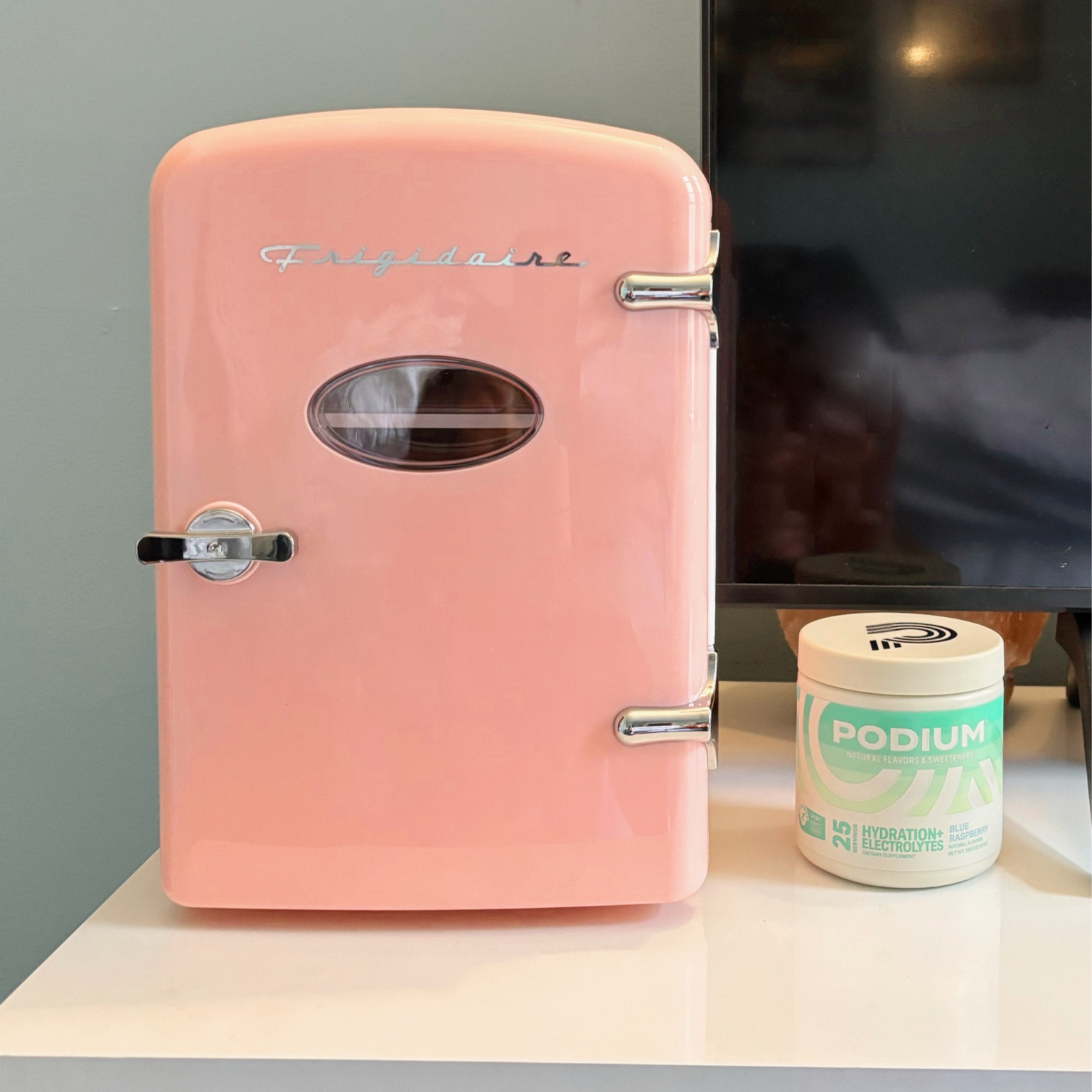 Podium and frigidaire on tv stand 🖤

#LTKHome #LTKBeauty