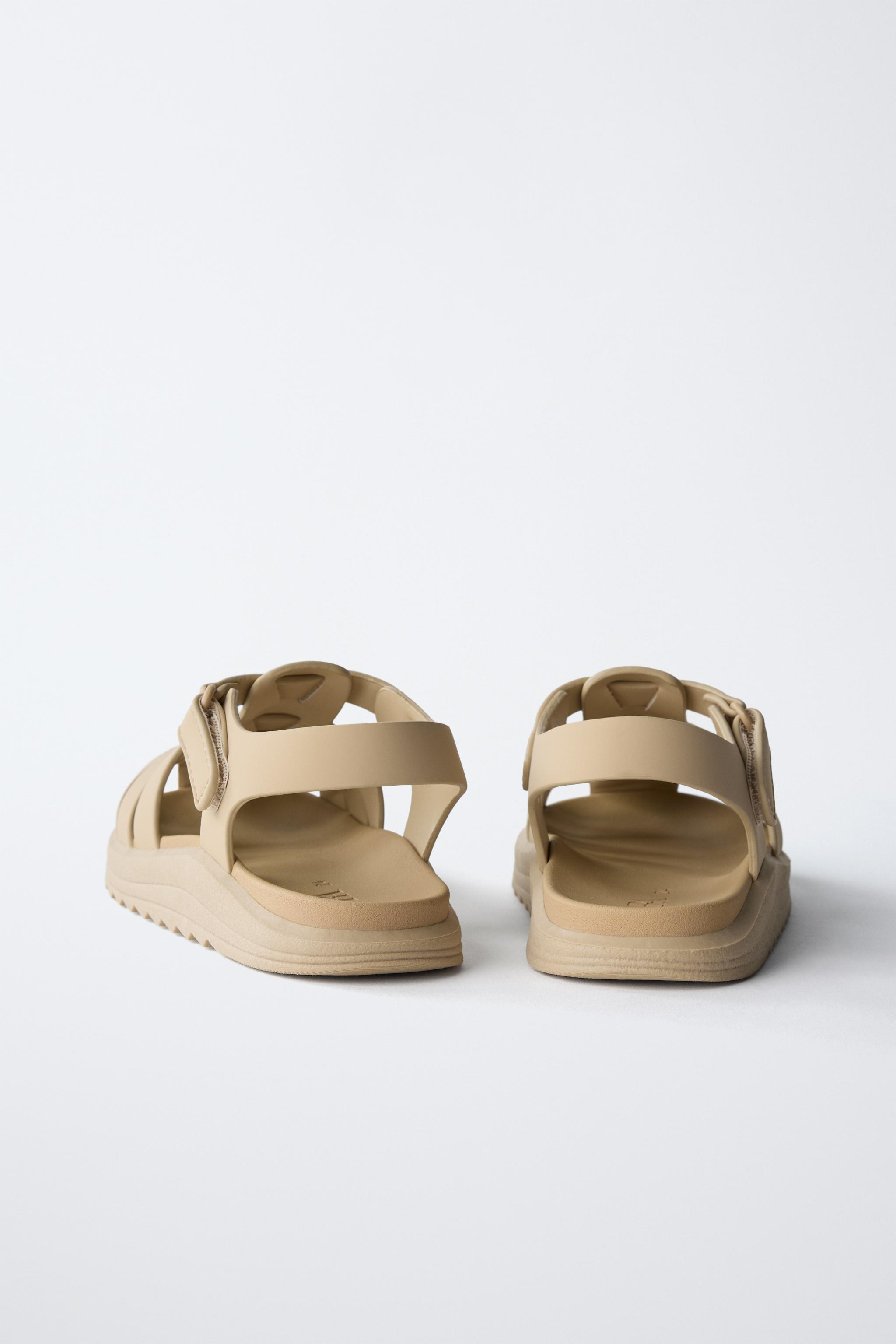 Rubber fisherman sandals with straps. Adhesive strap closure at back. Rubber soles. | Zara US