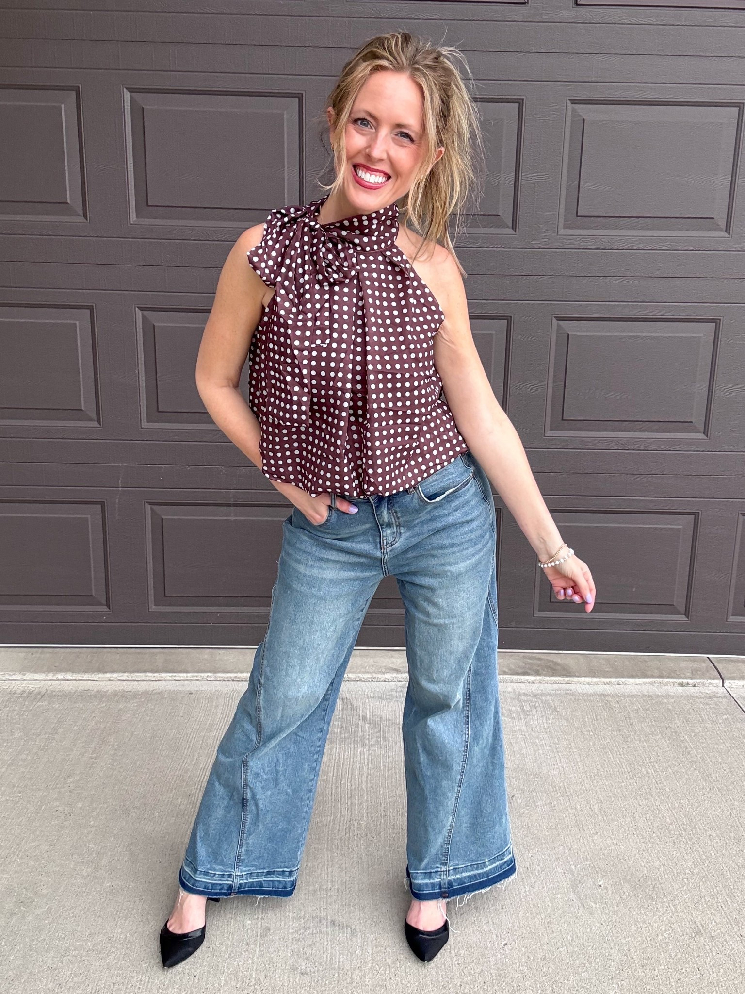 This polka dot halter top and these wide leg jeans with a slight flare are both so good! 🤎 Would be great for a casual date night! Wearing an xsmall in the top and a 4 in the denim.

As an Amazon Influencer I earn commission on qualifying purchases.

Brown polka dot top, light wash denim, effortless spring look, mom style, fun fashion, spring outfit idea 2026, trendy top

#LTKootd #LTKOver40 #LTKMidsize