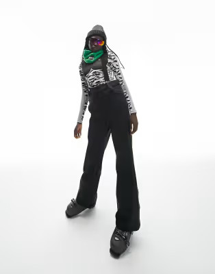 Topshop Sno flared ski pants with suspenders in black | ASOS (Global)