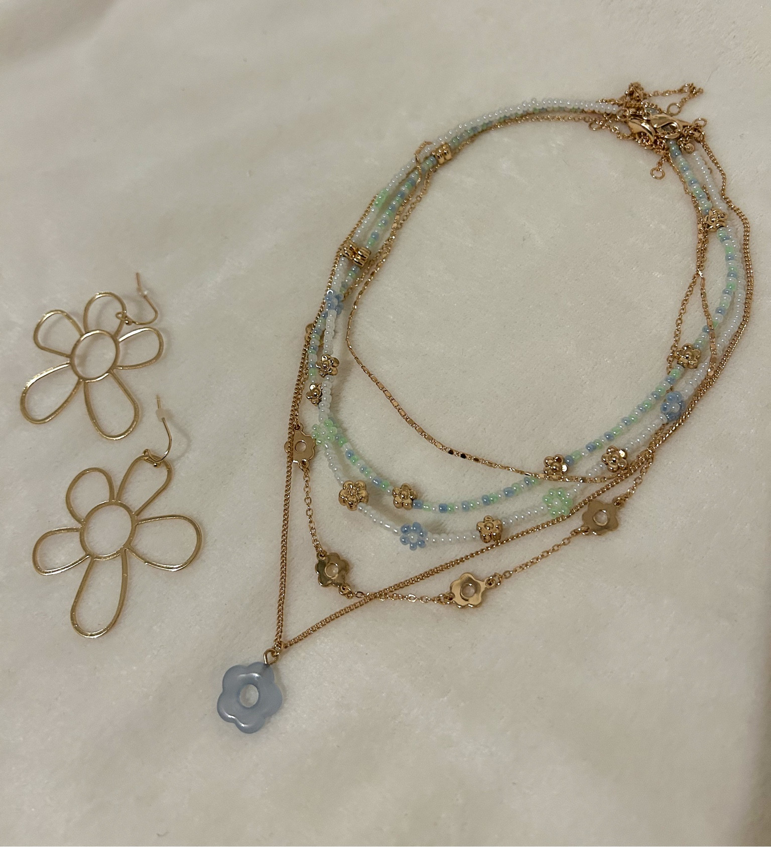 The cutest necklace and earring pairing.

Necklace. Earrings. Stackable necklaces. Flower jewelry. Gift idea. Coastal accessories.

#LTKsalealert #LTKGiftGuide #LTKfindsunder50