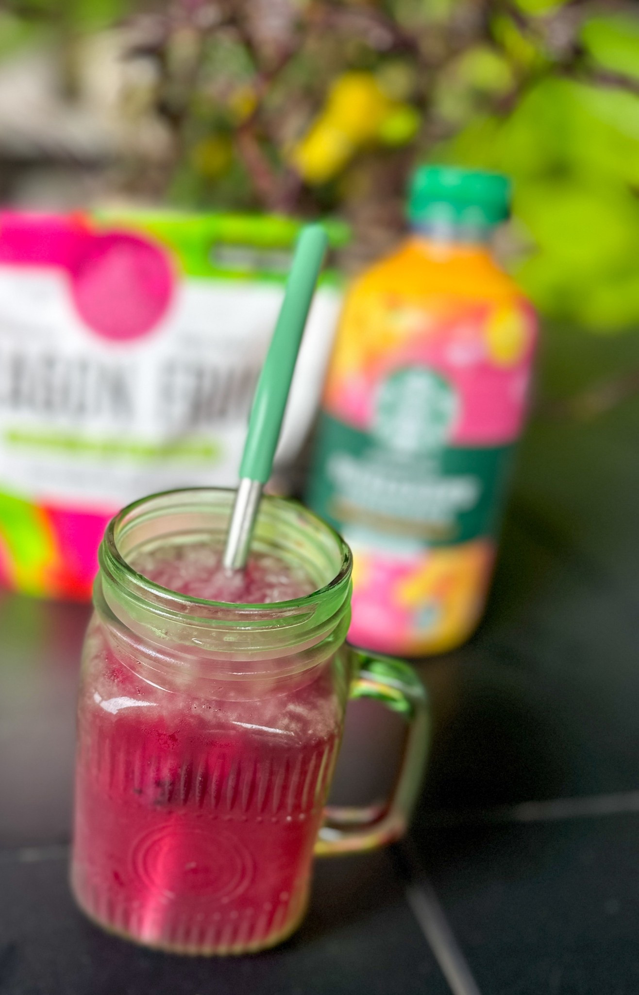 Starbucks refresher at home. Served in these cute glass mugs with a metal straw.  #StarbucksRefreshers #Drinks #AtHomewithDSF #SpringDrinks #DrinkRecipes 