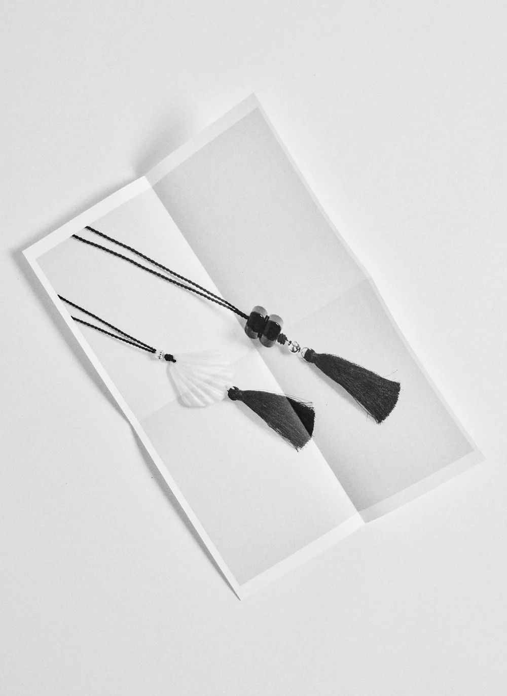 Black Resin Tassel Pendant Necklace | Mint Velvet
