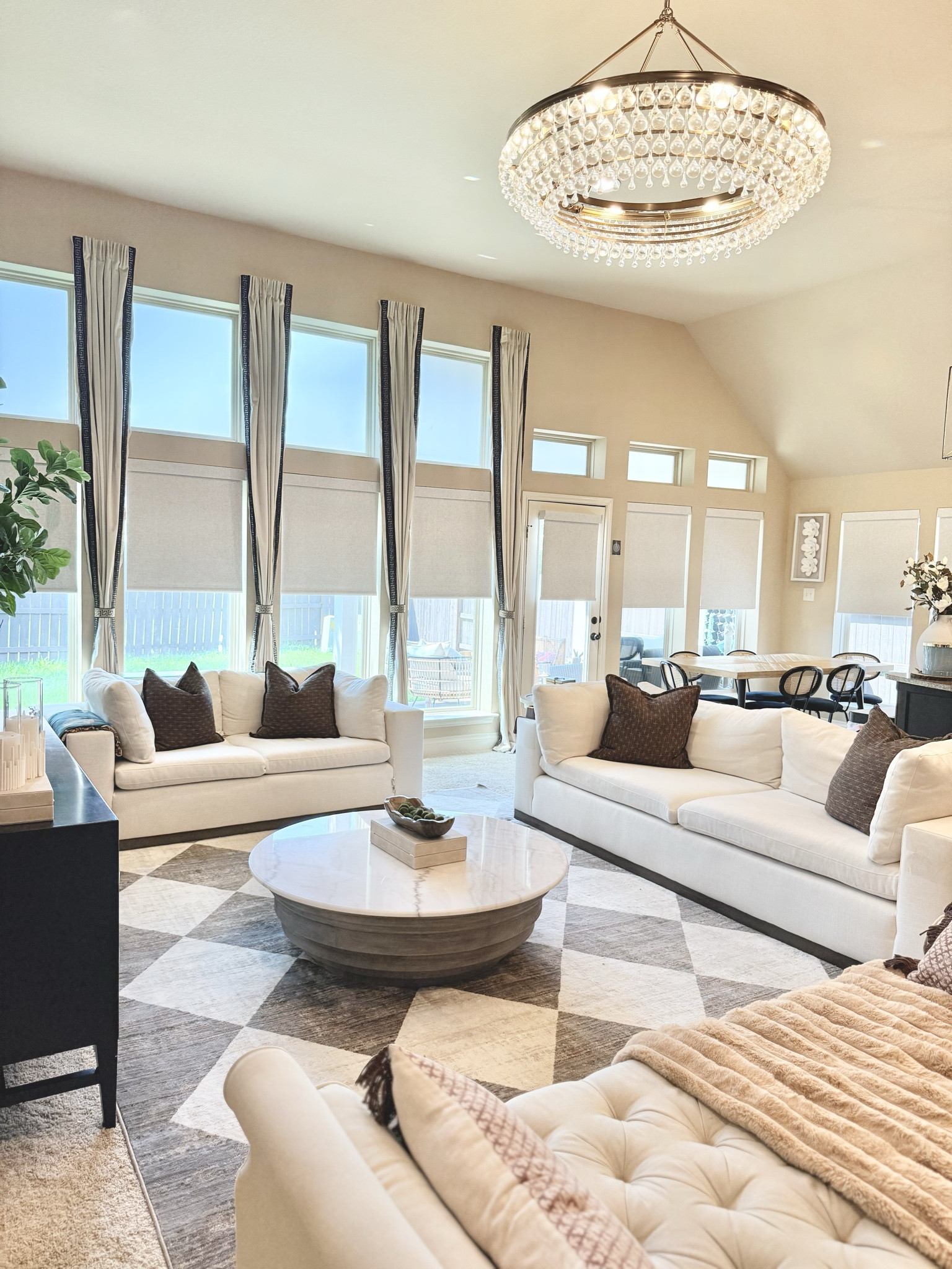 ✨ It’s all in the details.
I get so many questions about this space, so I linked our statement credenza, checkered rug, and marble coffee table along with the sofas and motorized blinds that make the whole room feel polished and elevated. @amazon @wayfair 

#LTKSeasonal #LTKHome #LTKSaleAlert