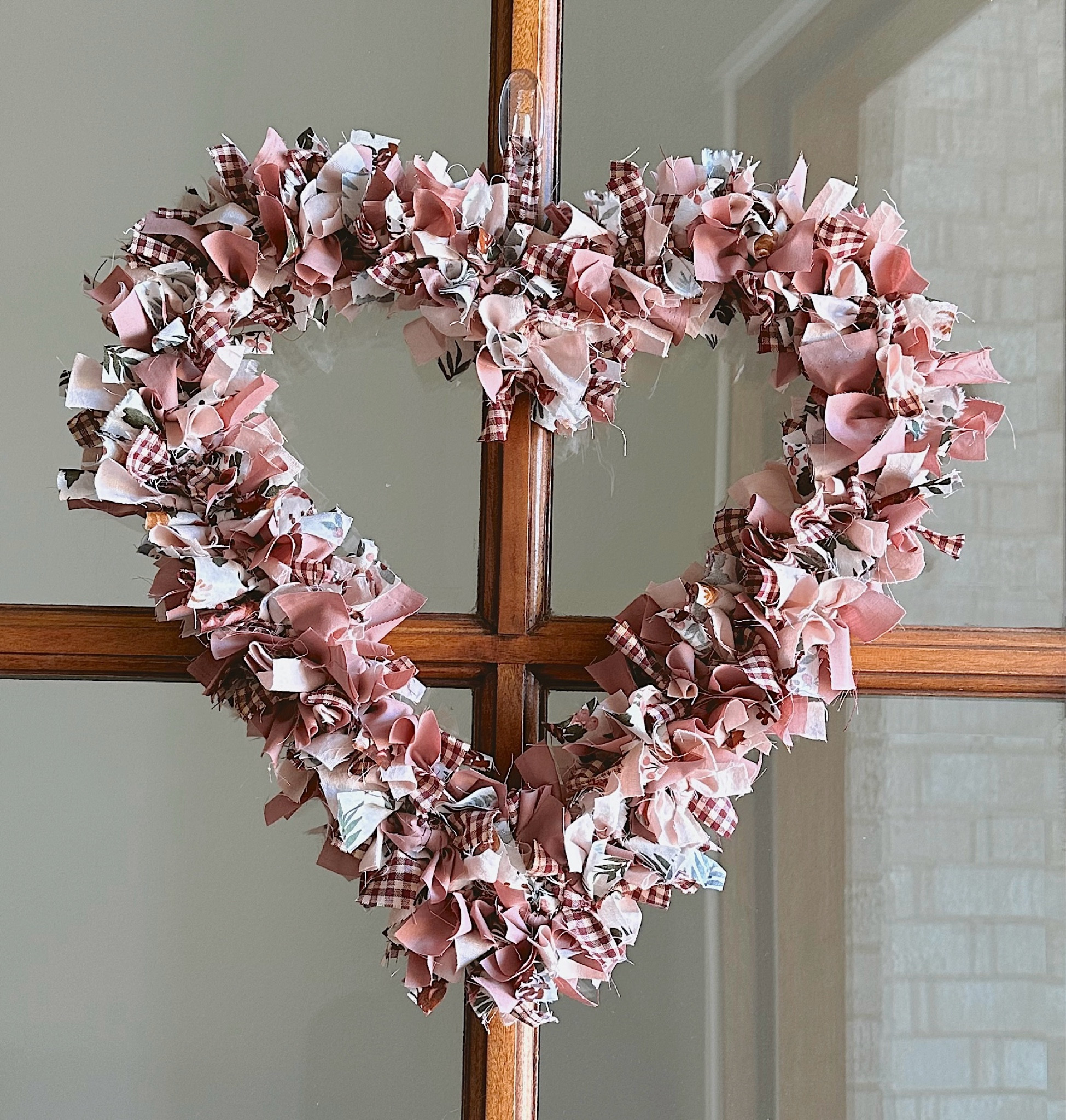 Love how this fun & easy DIY heart wreath turned out. 

Here’s what you need:

🩷 12 inch heart wire wreath frame 
❤️ 1/2 a yard of 4-6 different fabrics (solids & prints)
🩷 fabric scissors 

How to make it:
❤️ double your fabric & cut into strips roughly 6” long and 1” wide 
🩷 Tie a single knot to attach the fabric to the wire wreath frame, alternate fabrics & continue to tie fabric until the entire frame is covered 

Hang it up & enjoy! 💝

#diy #diycrafts #diyhomedecor #diydecorations #diyprojects #valentinediy #diyvalentinesdecor #diyvalentines #valentinecrafts #valentinecraft #valentinewreath #heartwreath #diywreath #diywreaths #wreathmaking #wreathmaking #girlstime #valentinedecor

#LTKSeasonal #LTKHome